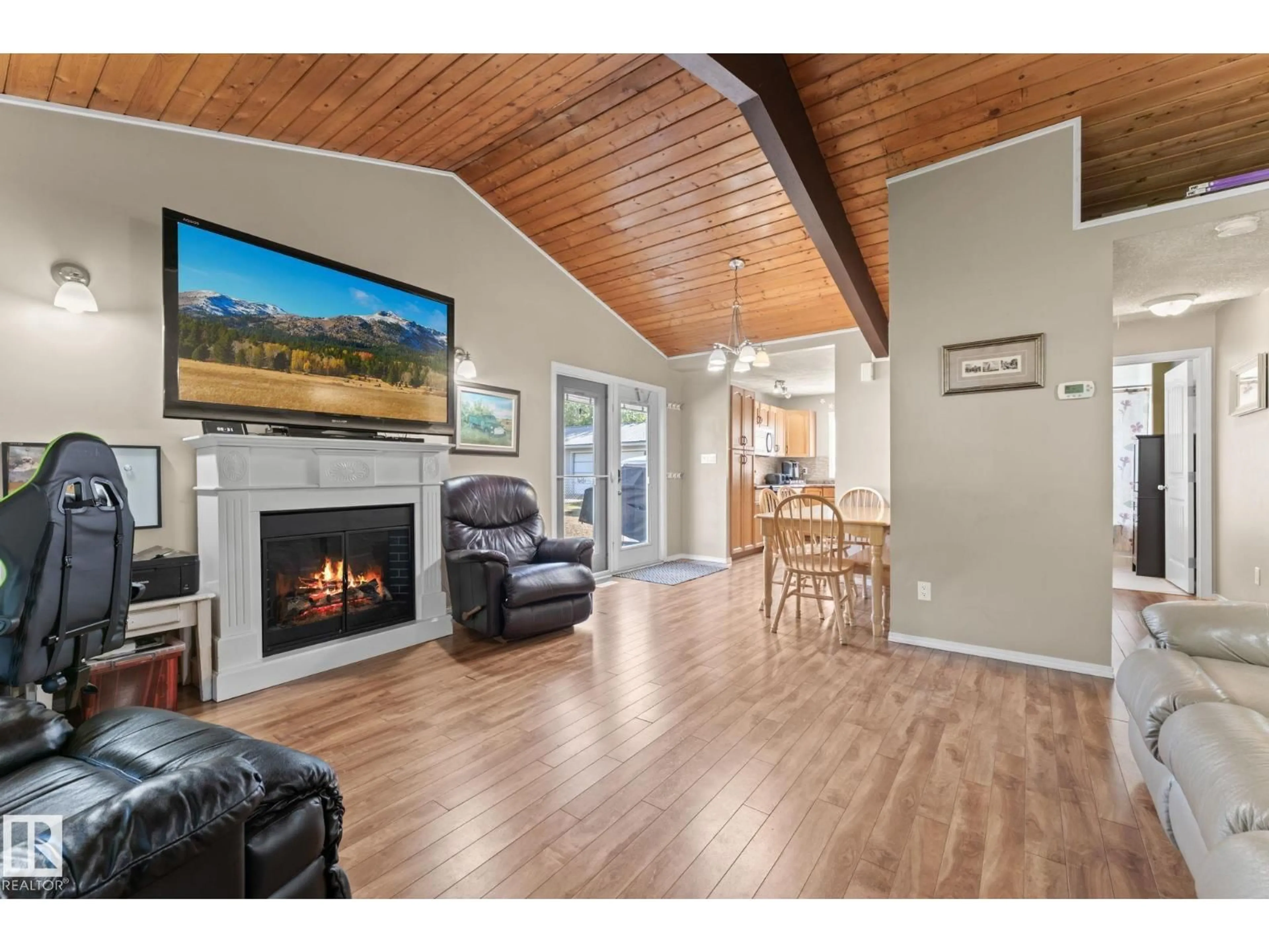 Living room with furniture, wood/laminate floor for 26 RGE ROAD 212 A, Rural Strathcona County Alberta T8G1B2