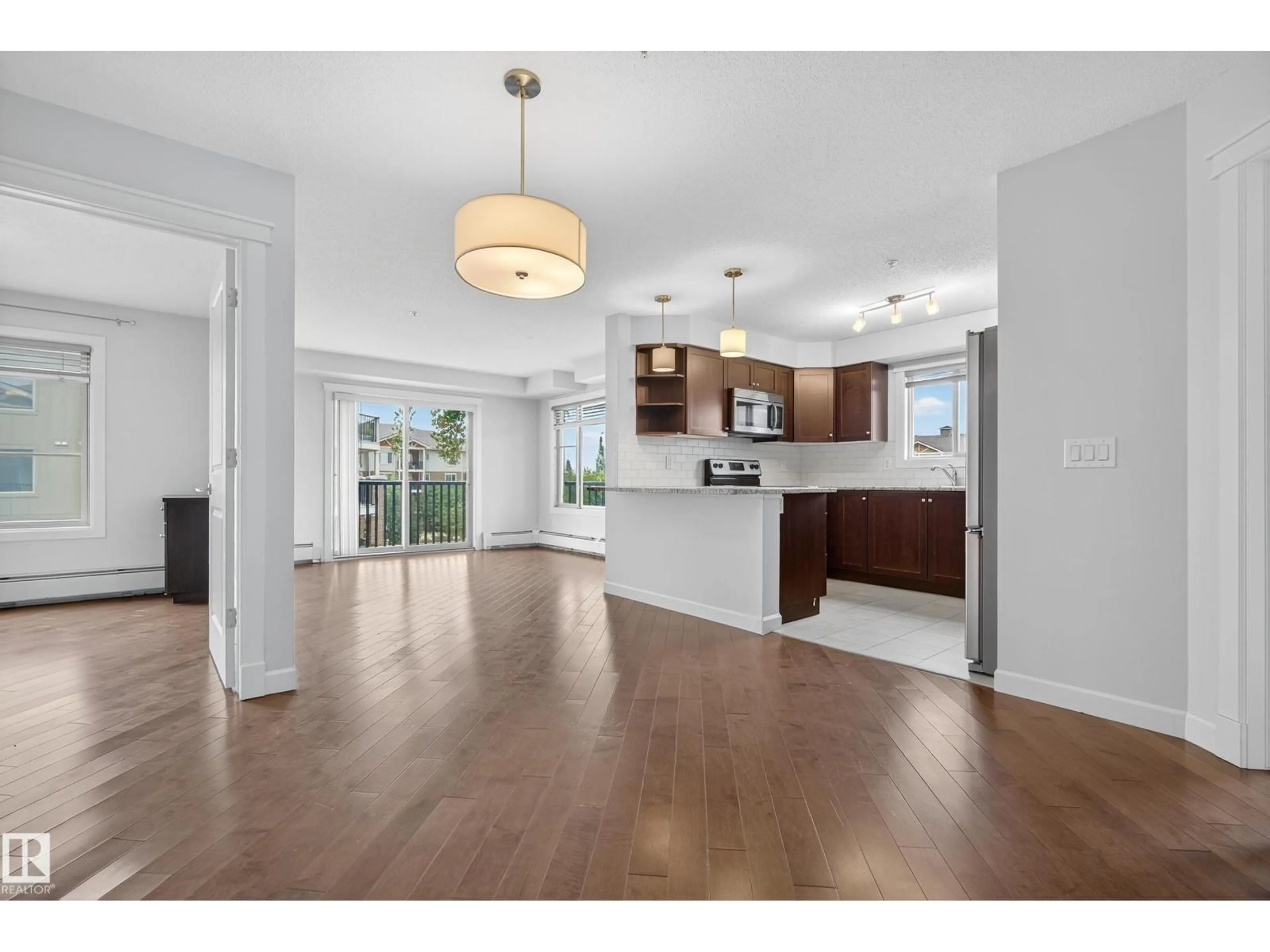 Open concept kitchen, unknown for 316 - 3715 WHITELAW LN, Edmonton Alberta T6W2C3