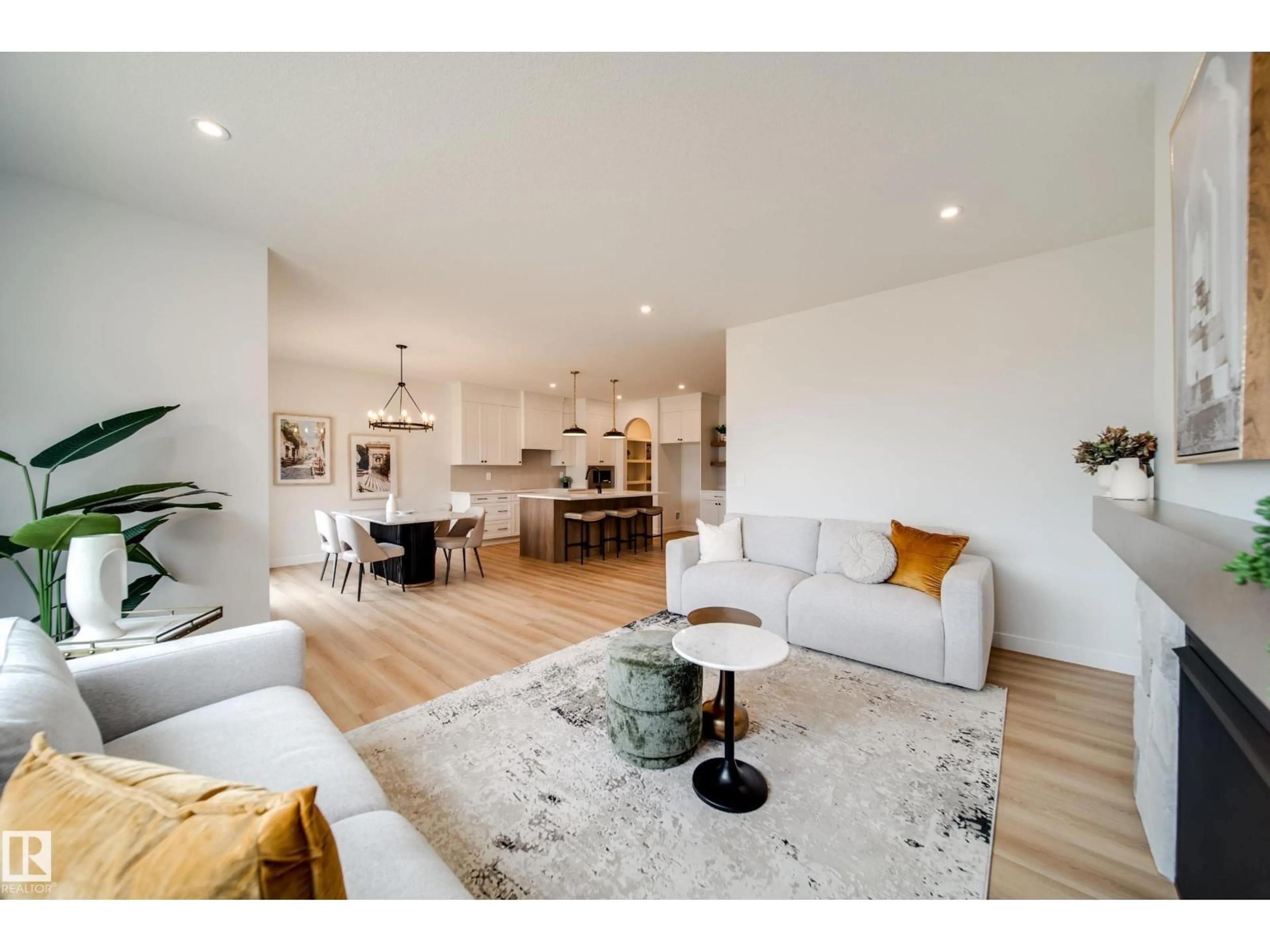 Living room with furniture, wood/laminate floor for 14 CLOUTIER CL, St. Albert Alberta T8T2C9