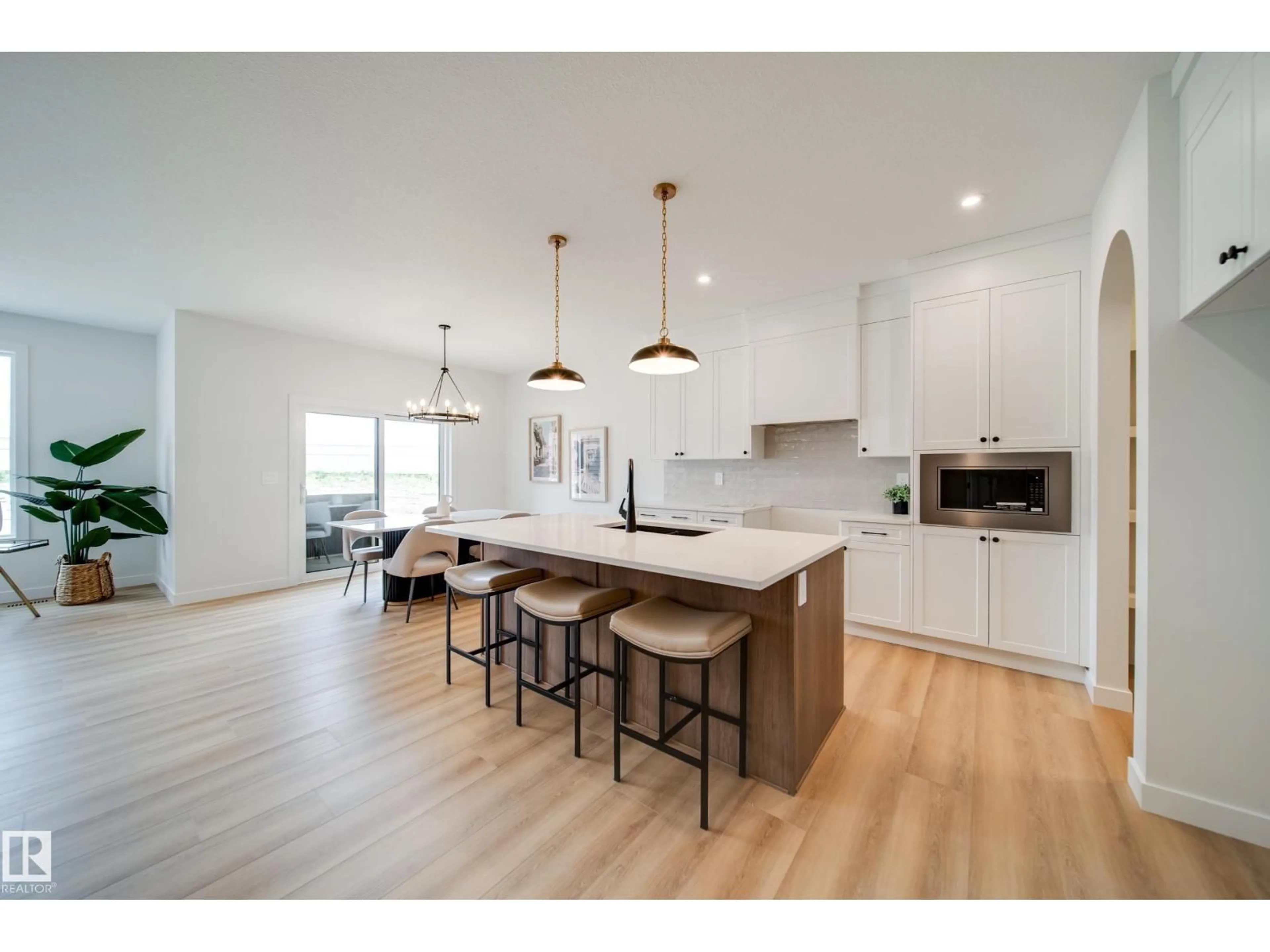 Open concept kitchen, wood/laminate floor for 14 CLOUTIER CL, St. Albert Alberta T8T2C9