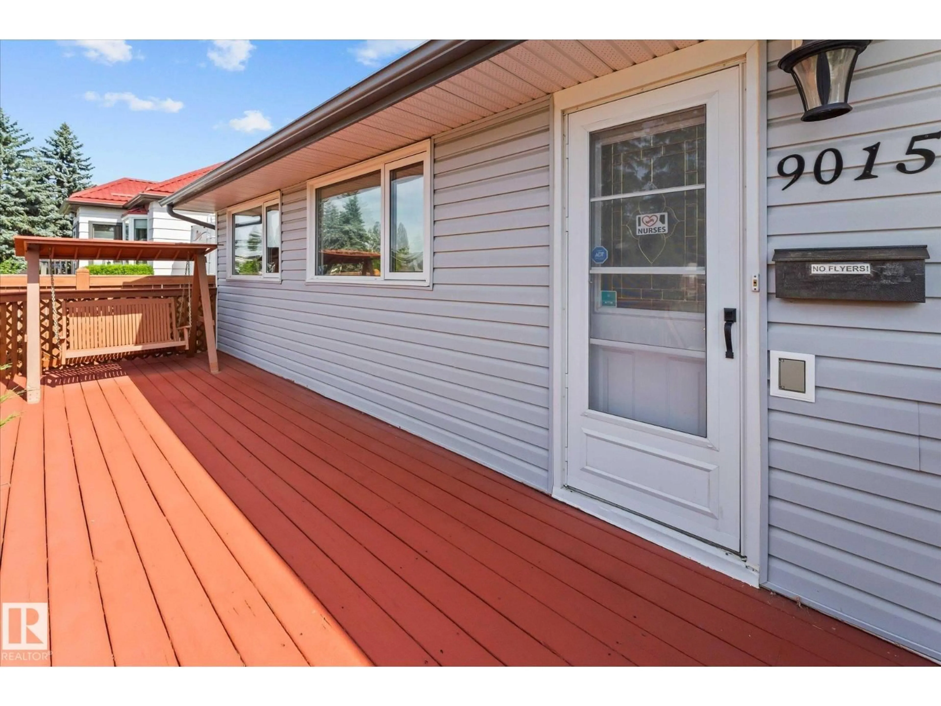 Home with vinyl exterior material, street for 9015 151 ST, Edmonton Alberta T5R1J4