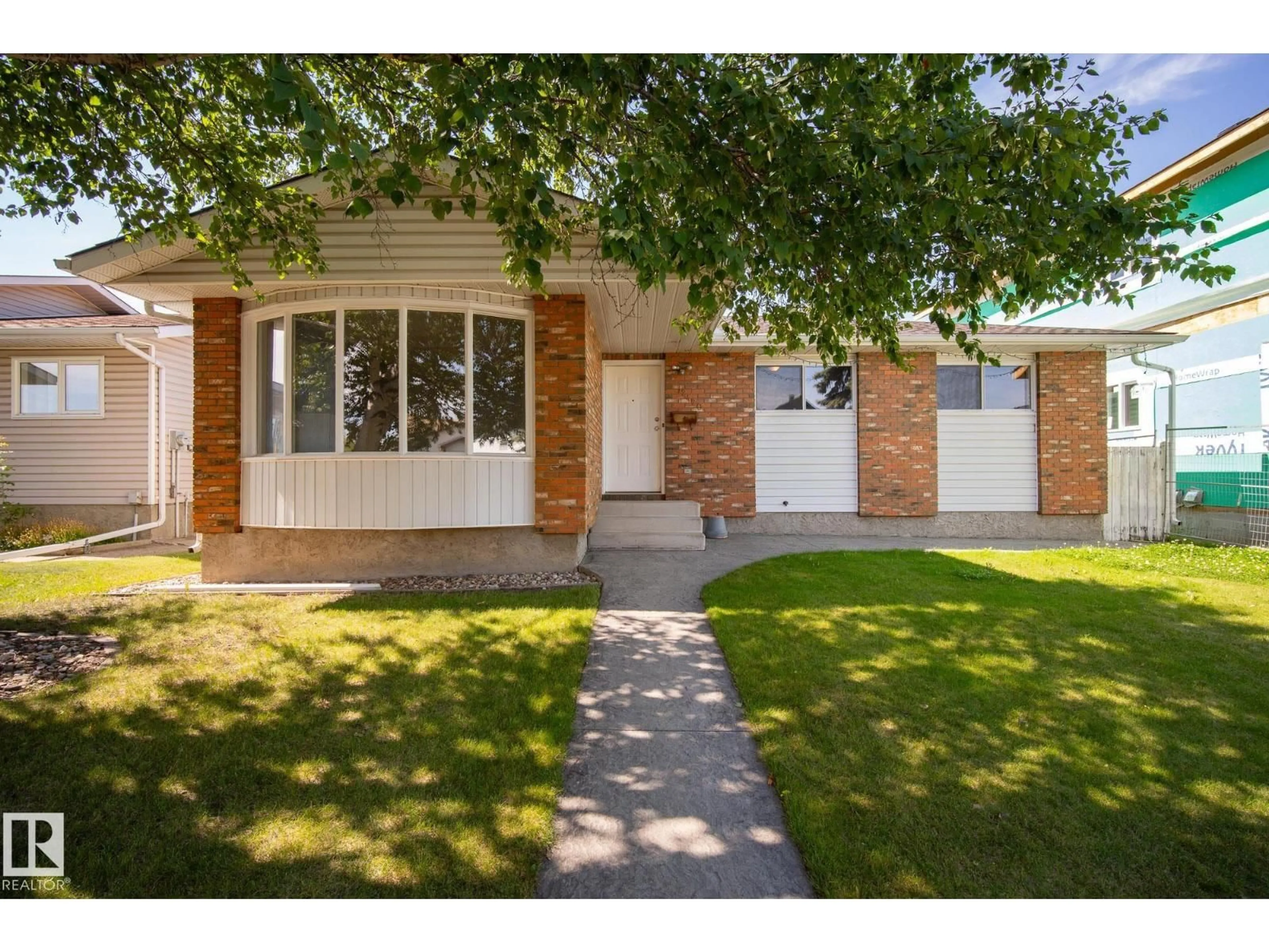 Home with brick exterior material, street for NW - 12420 47 ST, Edmonton Alberta T5W5E5