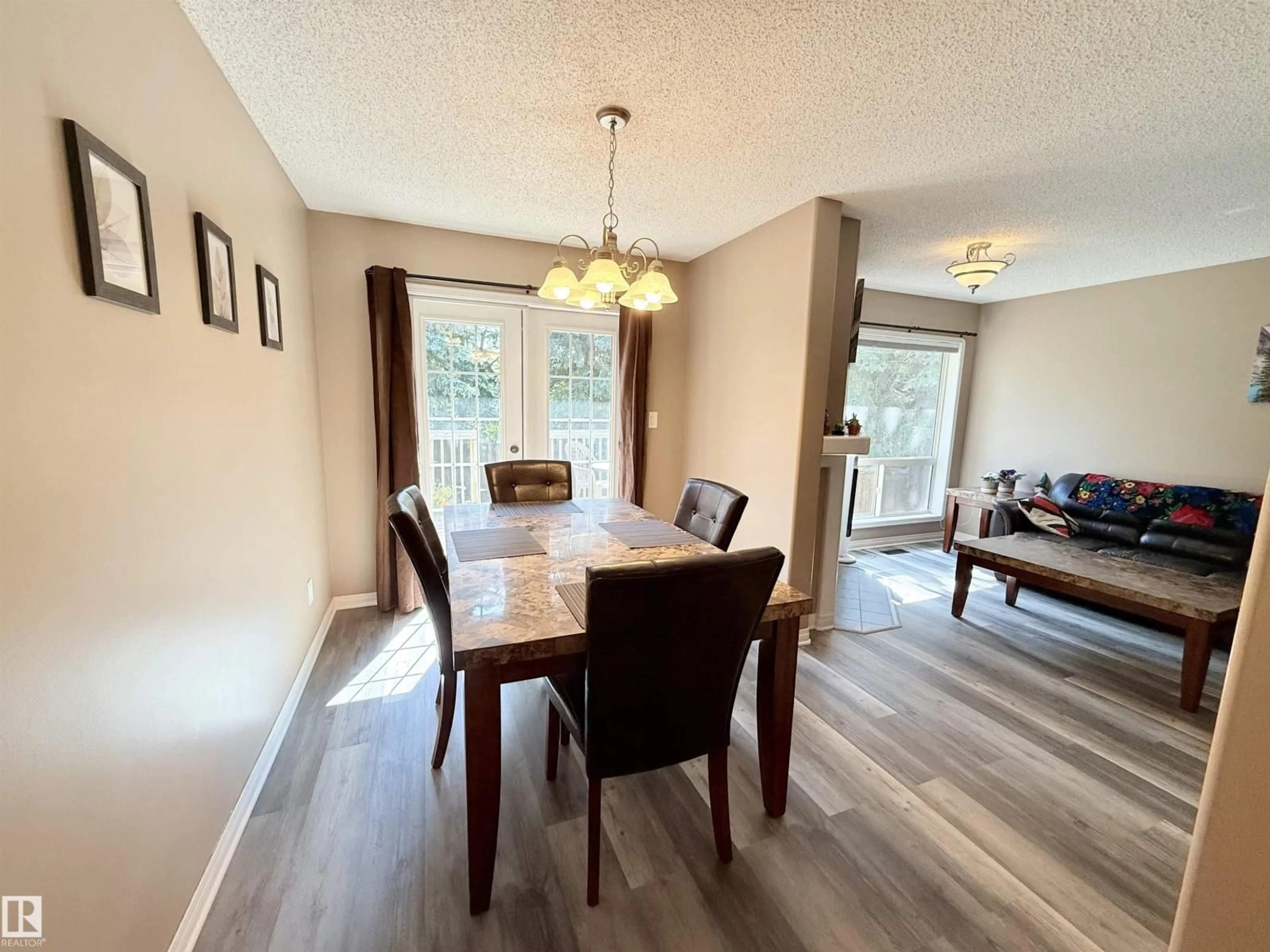 Dining room, wood/laminate floor for NW - 17053 113 ST, Edmonton Alberta T5X5Y9