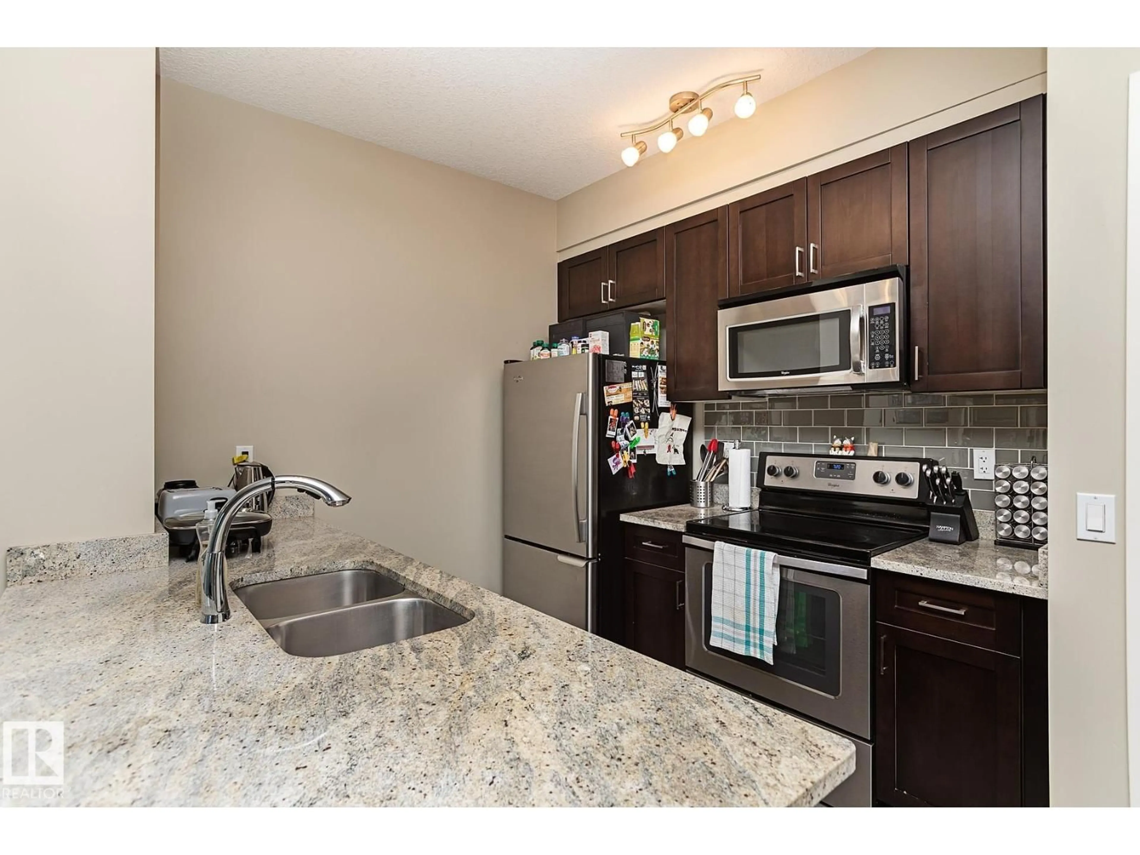 Standard kitchen, unknown for #209 - 1238 WINDERMERE WY, Edmonton Alberta T6W2J3
