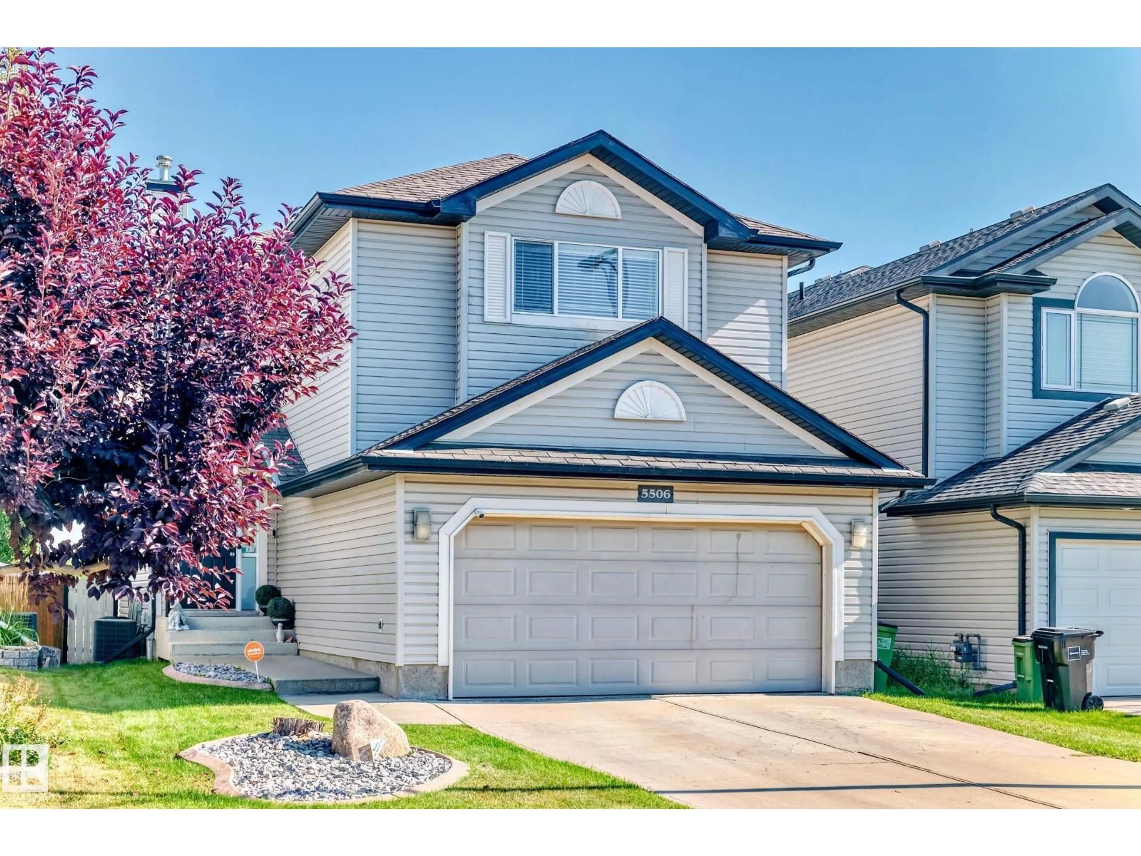 Home with vinyl exterior material, street for NW - 5506 165 AV, Edmonton Alberta T5Y3K8