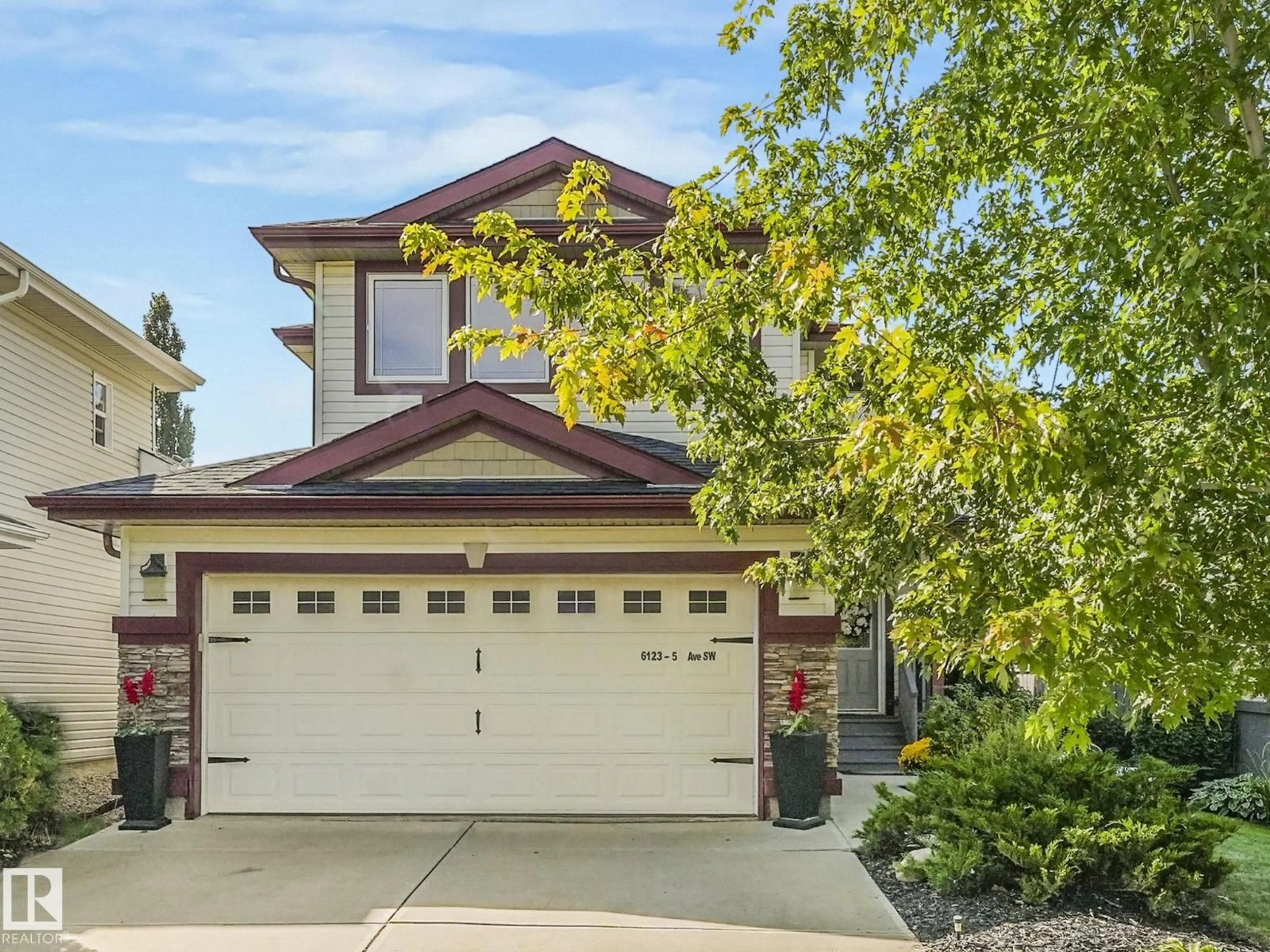 Home with vinyl exterior material, street for SW - 6123 5 AV, Edmonton Alberta T6X0E8