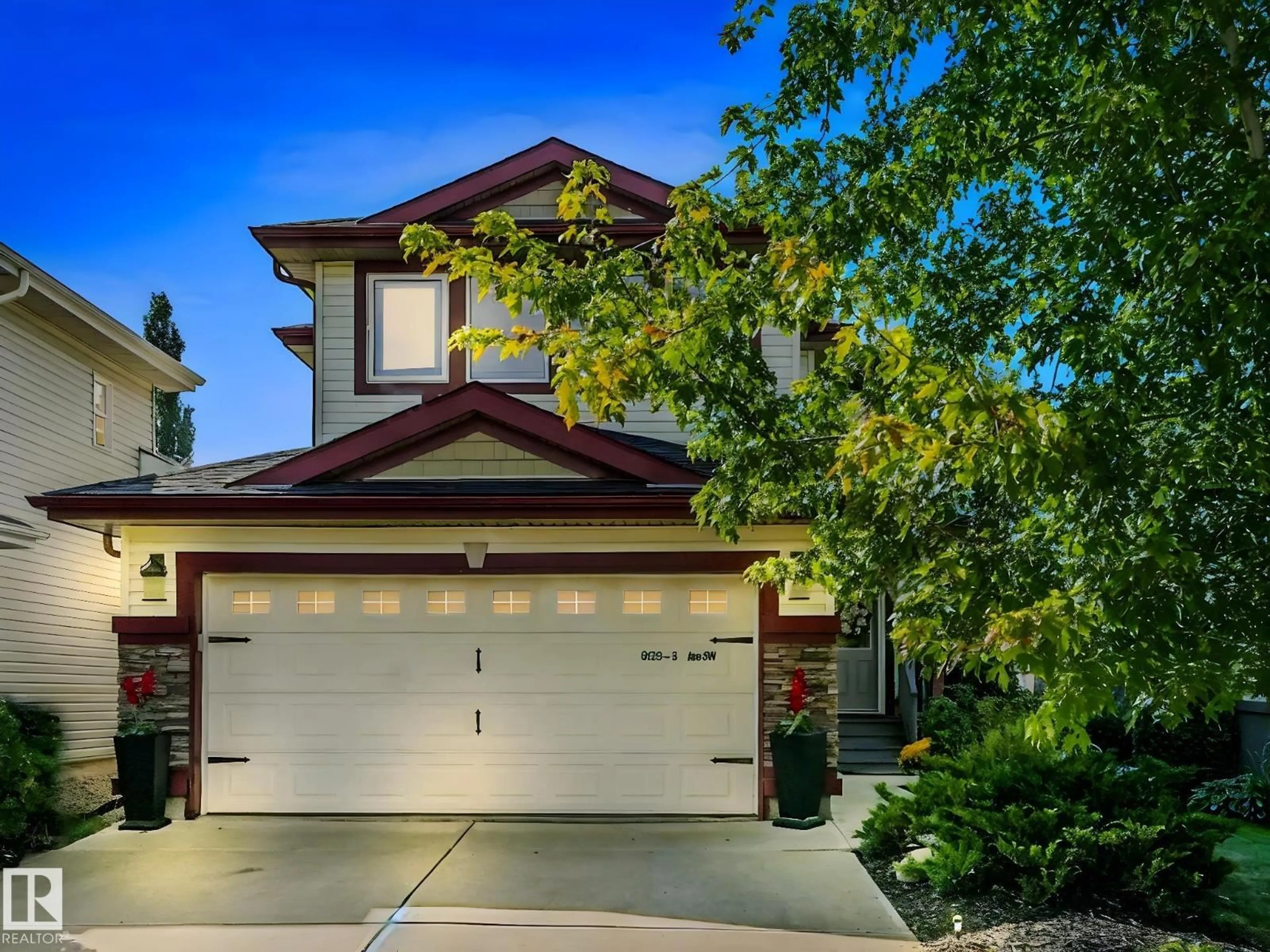 Home with vinyl exterior material, street for SW - 6123 5 AV, Edmonton Alberta T6X0E8