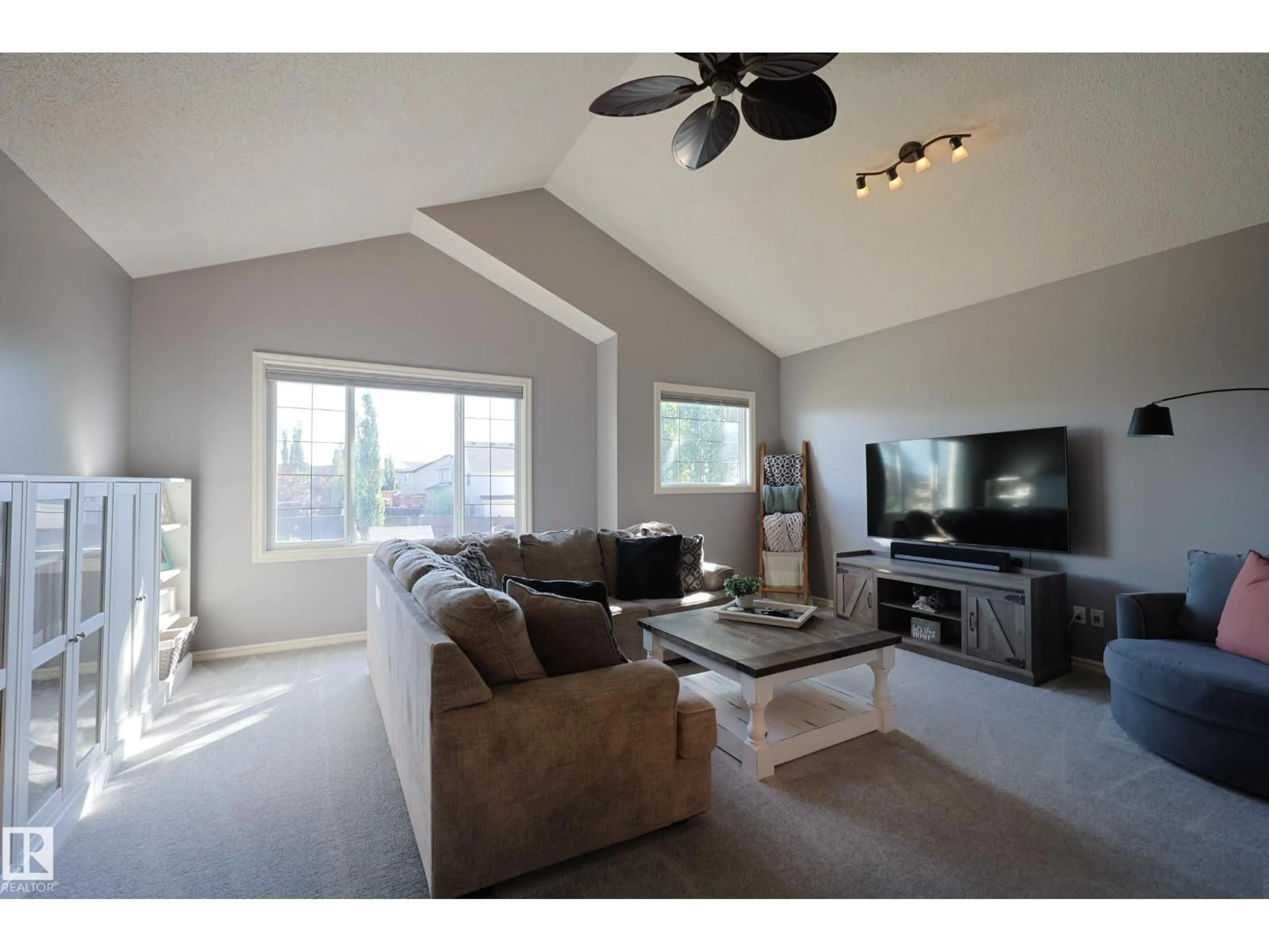 Living room with furniture, unknown for 10310 96 ST, Morinville Alberta T8R0B4