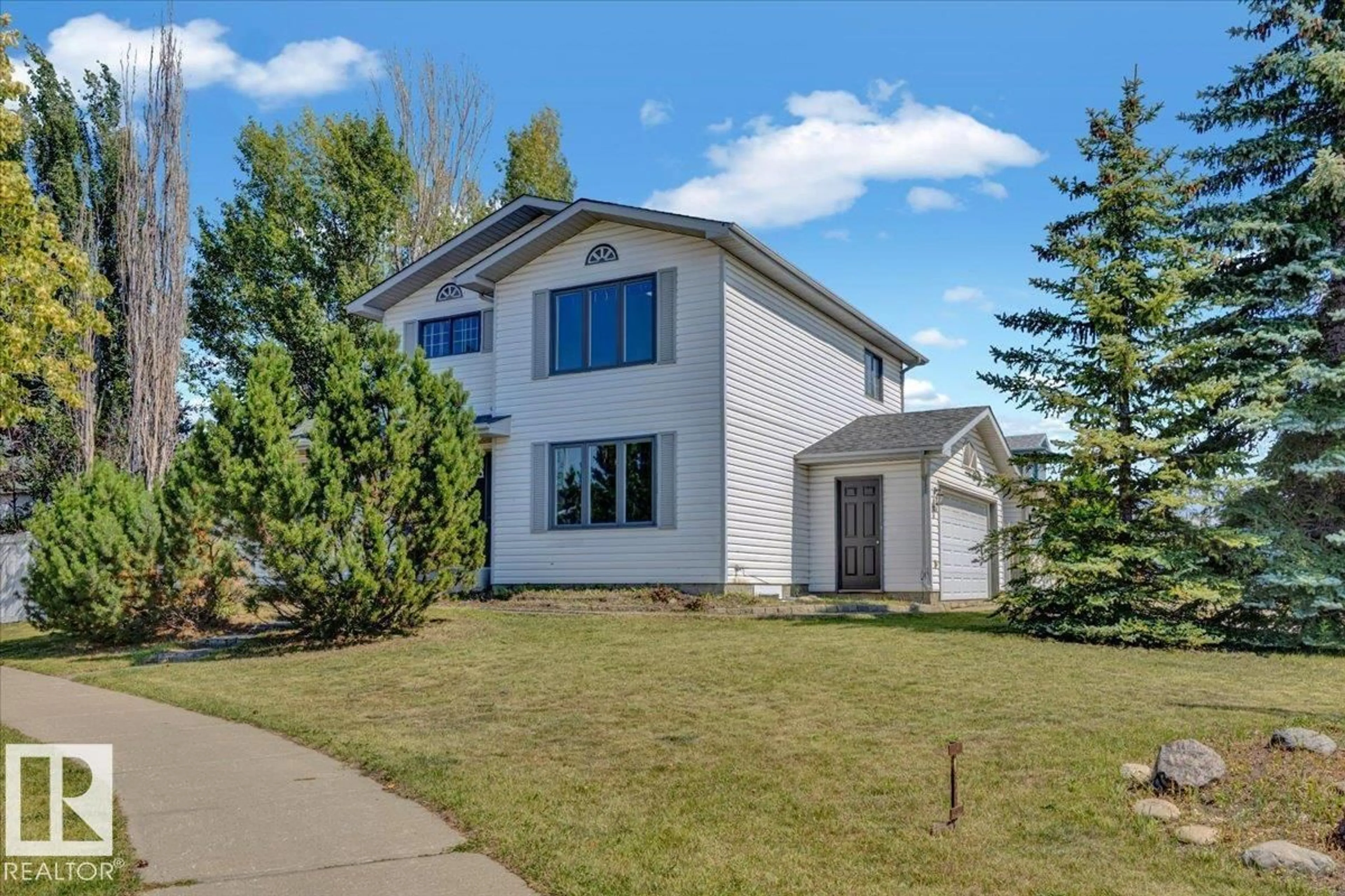 Home with vinyl exterior material, street for 12836 144 AV, Edmonton Alberta T6V1C7