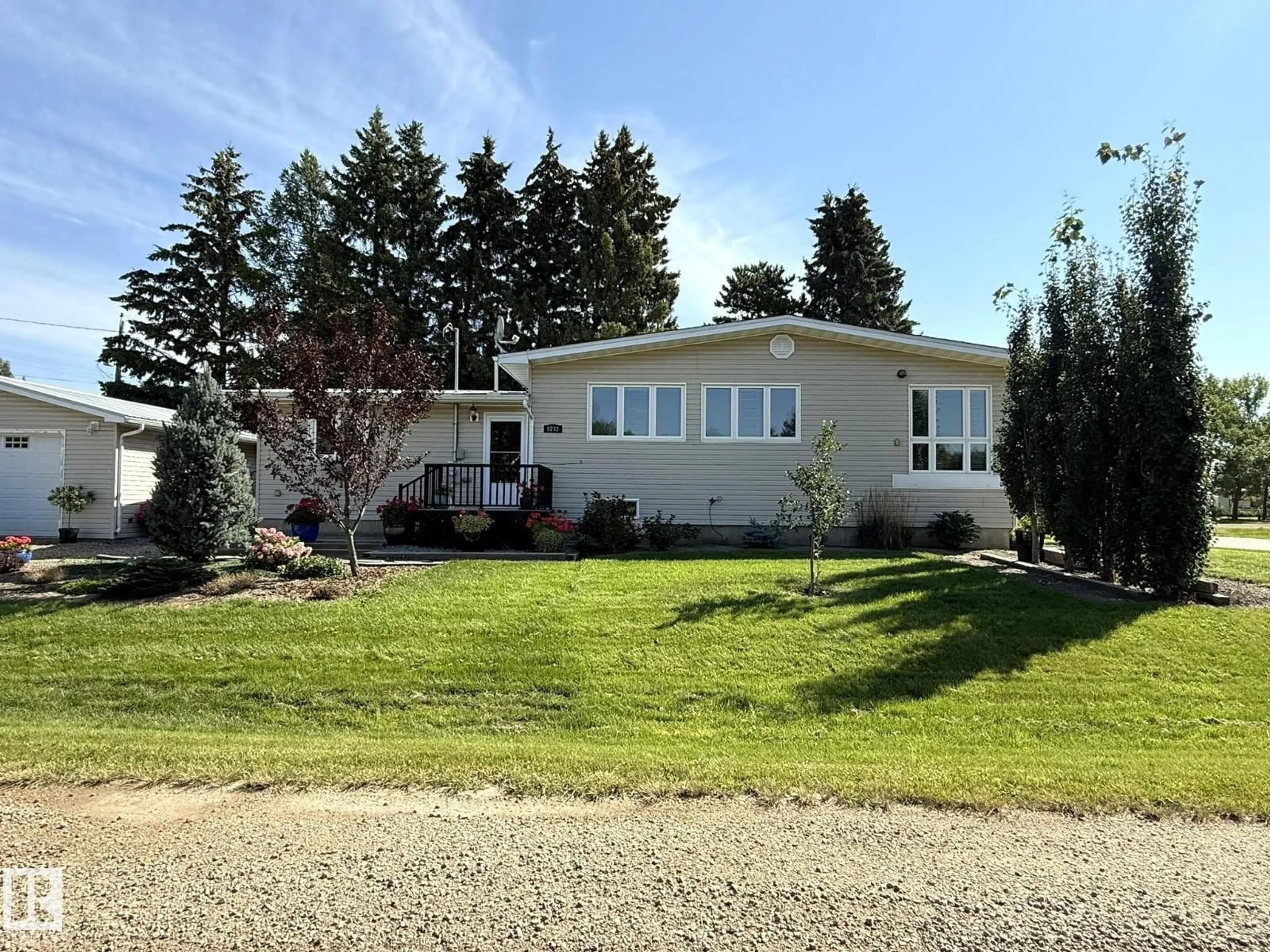 Home with vinyl exterior material, street for 5232 52 AV, Warburg Alberta T0C2T0