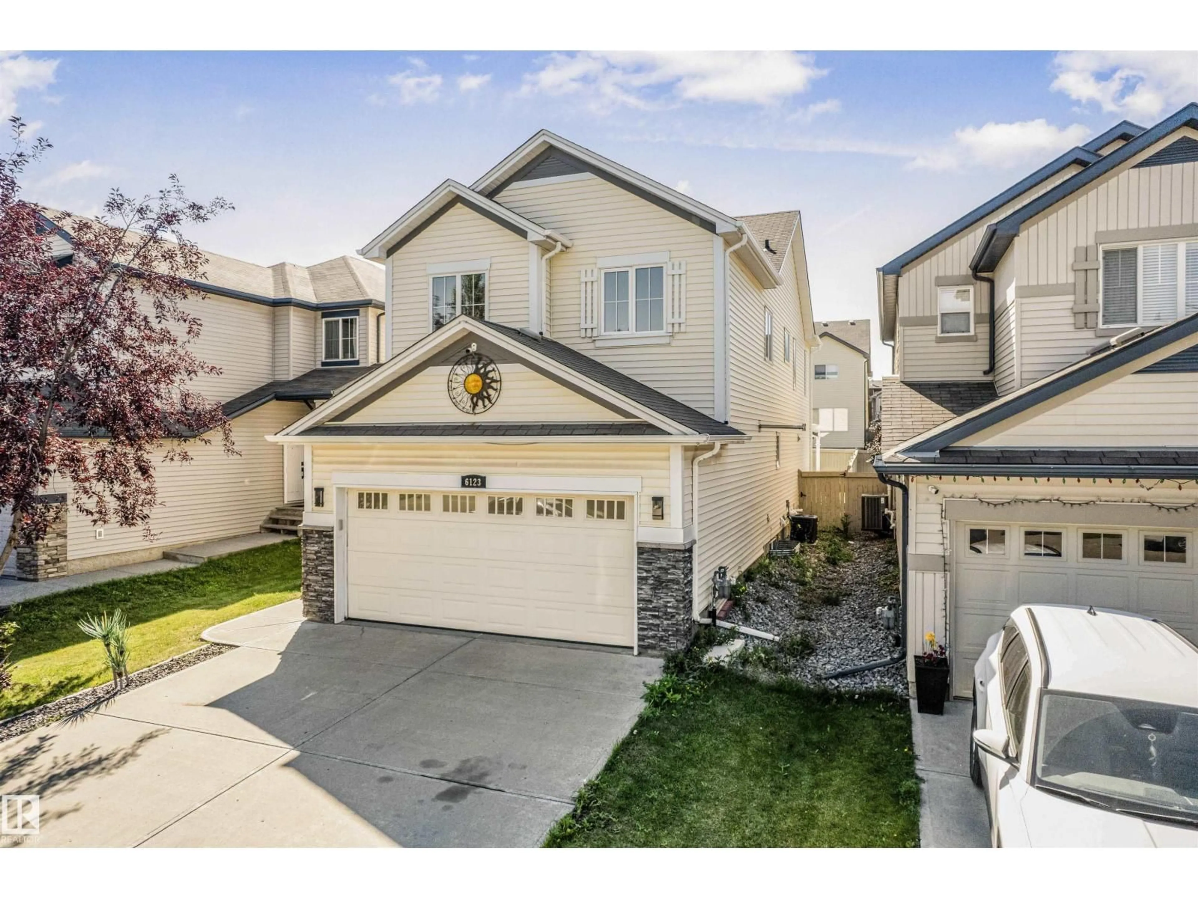 Home with vinyl exterior material, street for SW - 6123 11 AV, Edmonton Alberta T6X0M4