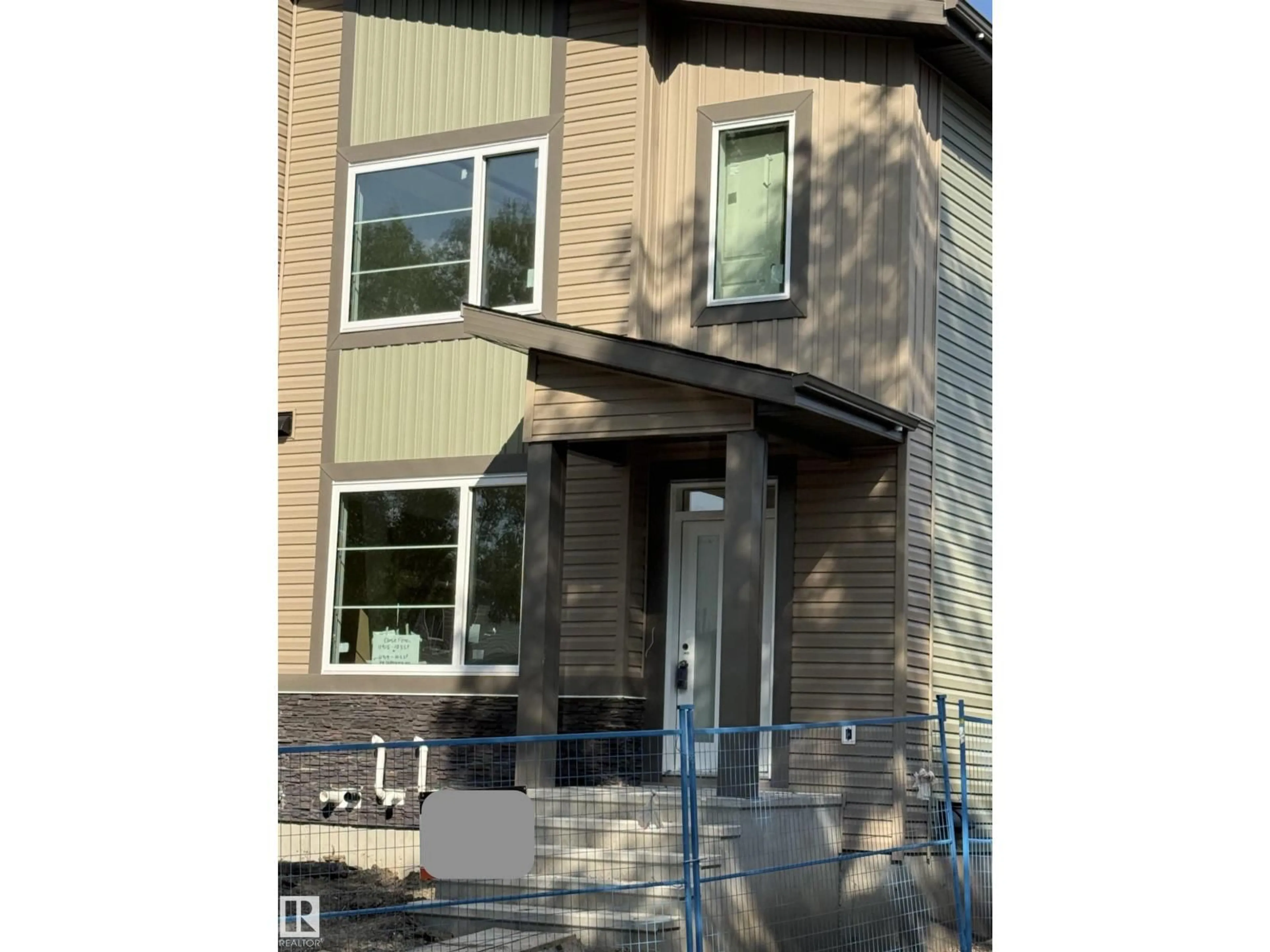 Home with vinyl exterior material, street for NW - 11915 123 ST, Edmonton Alberta T5L0G9