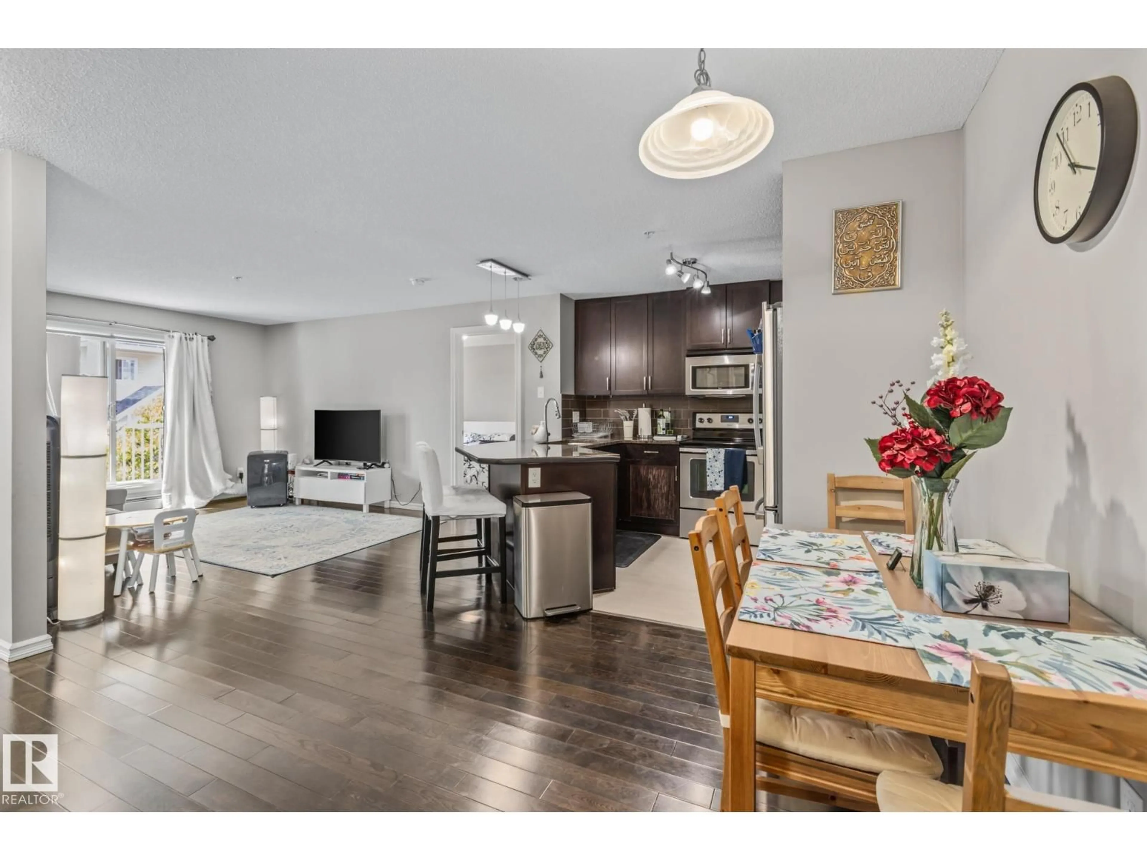 Open concept kitchen, wood/laminate floor for 208 - 2204 44 AV, Edmonton Alberta T6T0G5