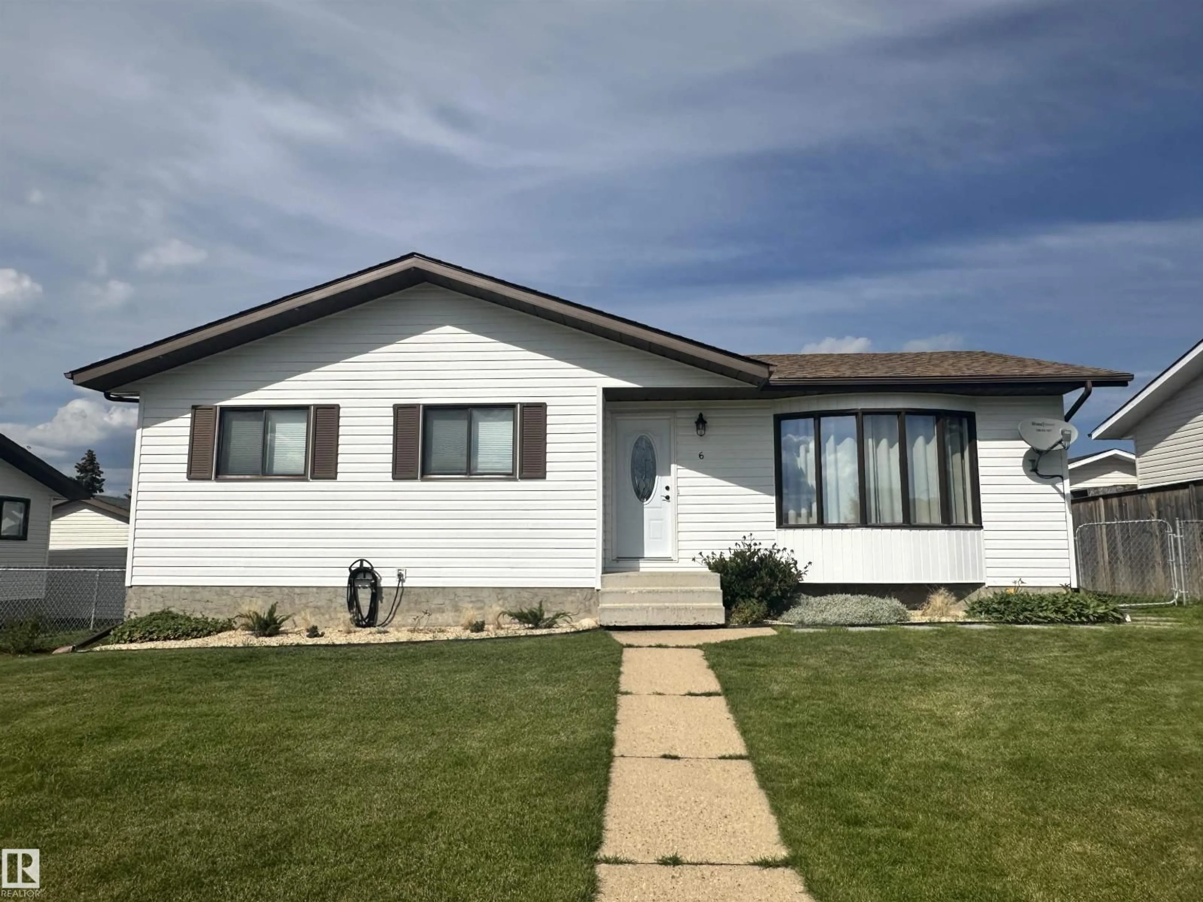 Home with vinyl exterior material, street for 6 ISBISTER AV, Swan Hills Alberta T0G2C0
