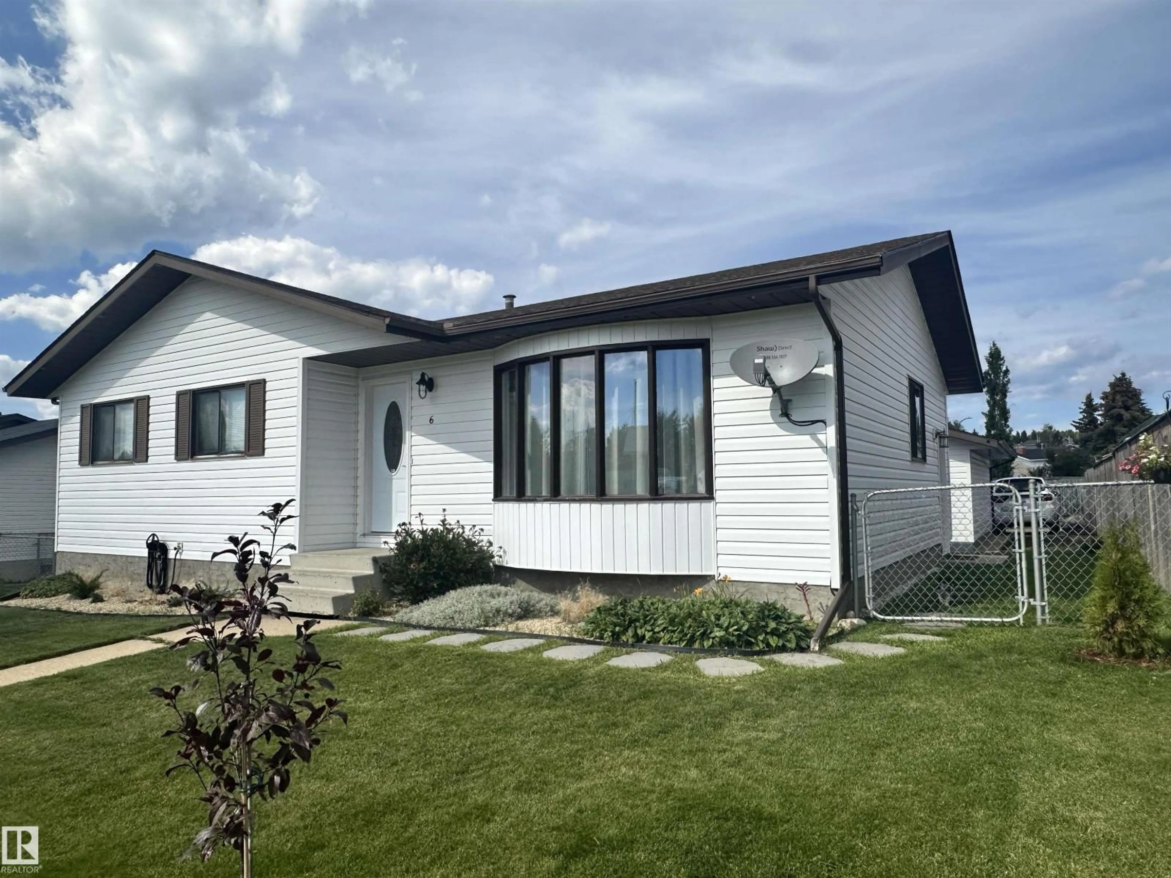 Home with vinyl exterior material, street for 6 ISBISTER AV, Swan Hills Alberta T0G2C0