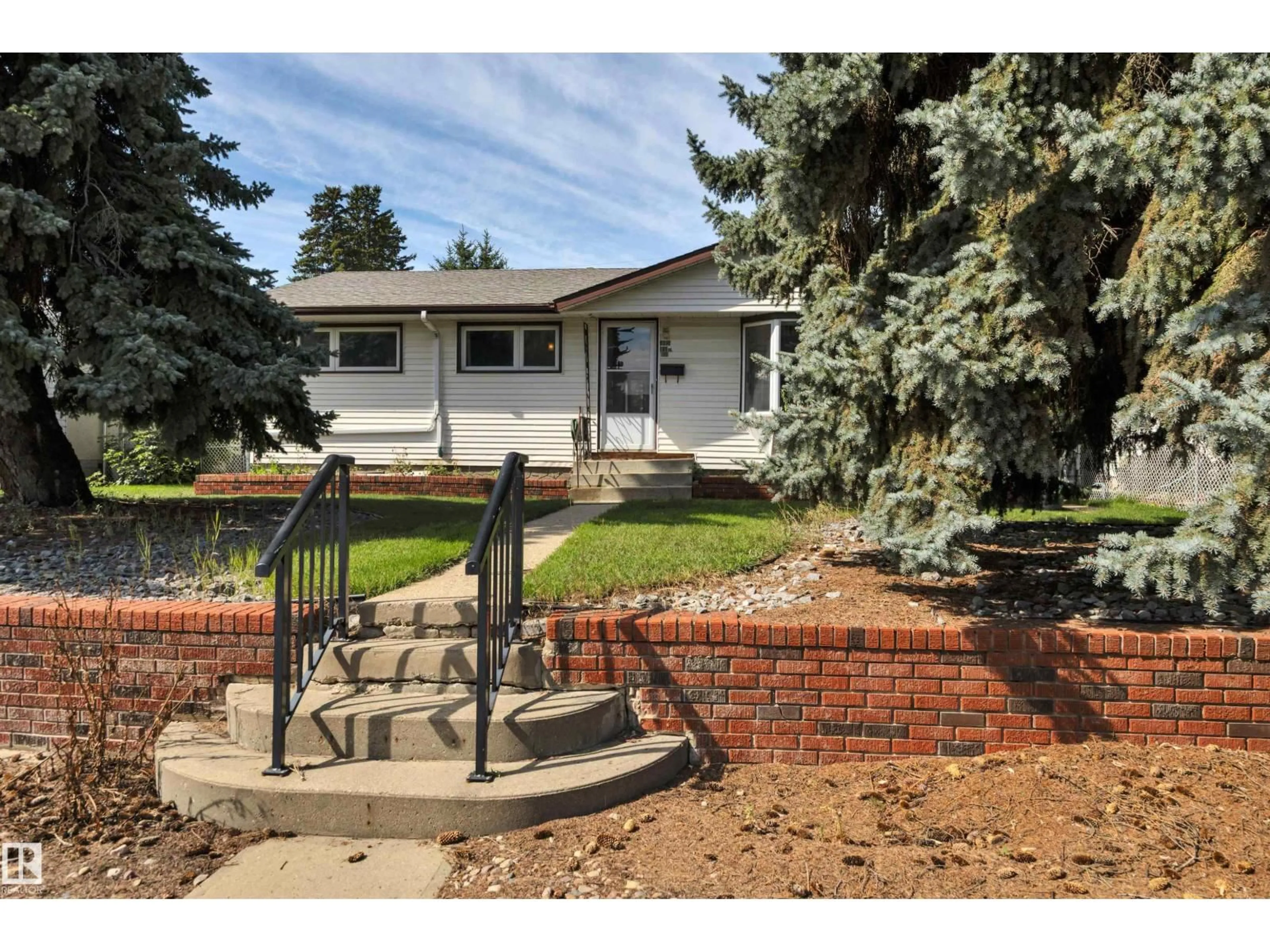 Home with brick exterior material, street for 8330 165 ST, Edmonton Alberta T5R2R4