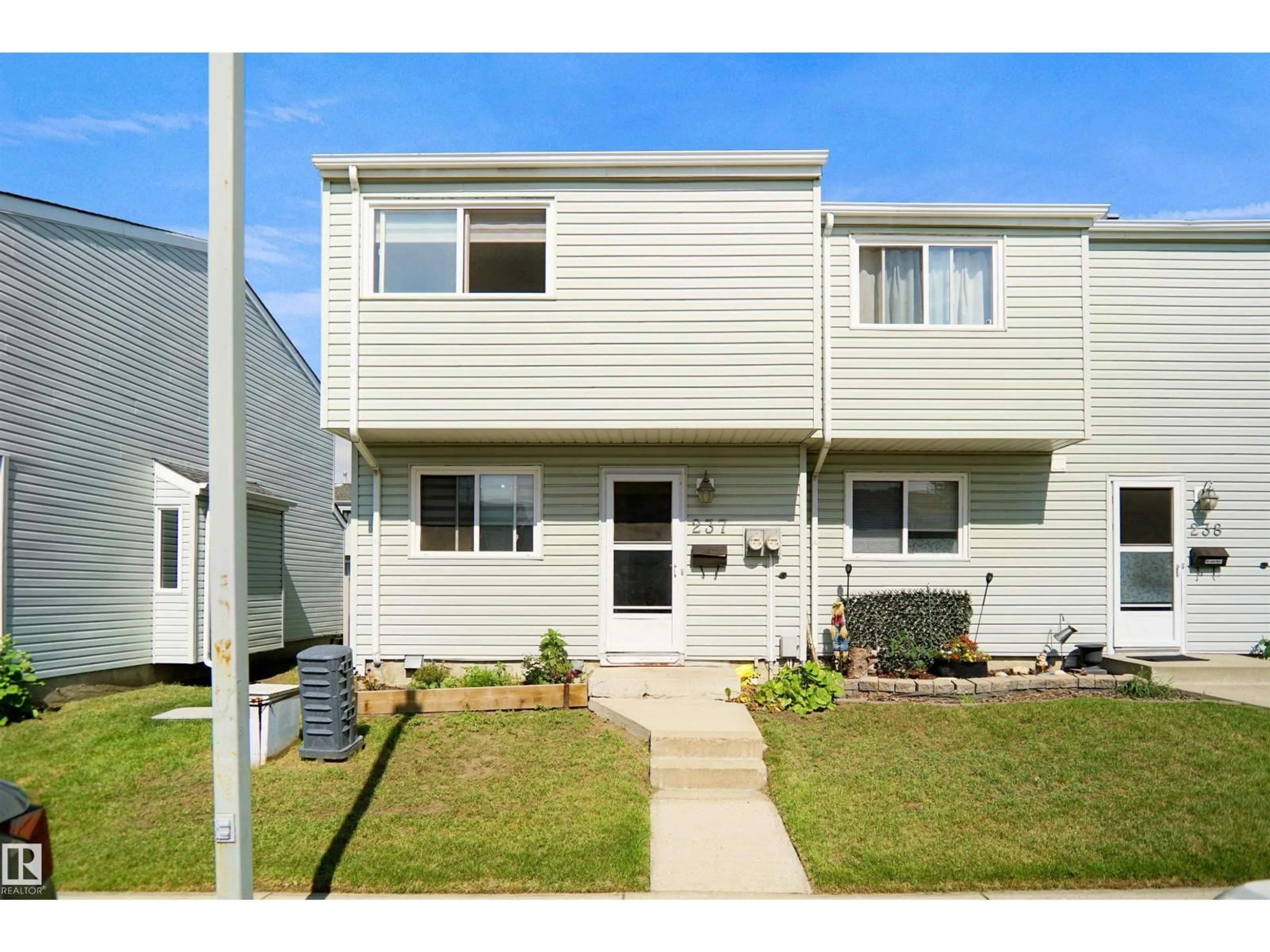 Home with vinyl exterior material, street for 237 DICKINSFIELD CO, Edmonton Alberta T5E5V8