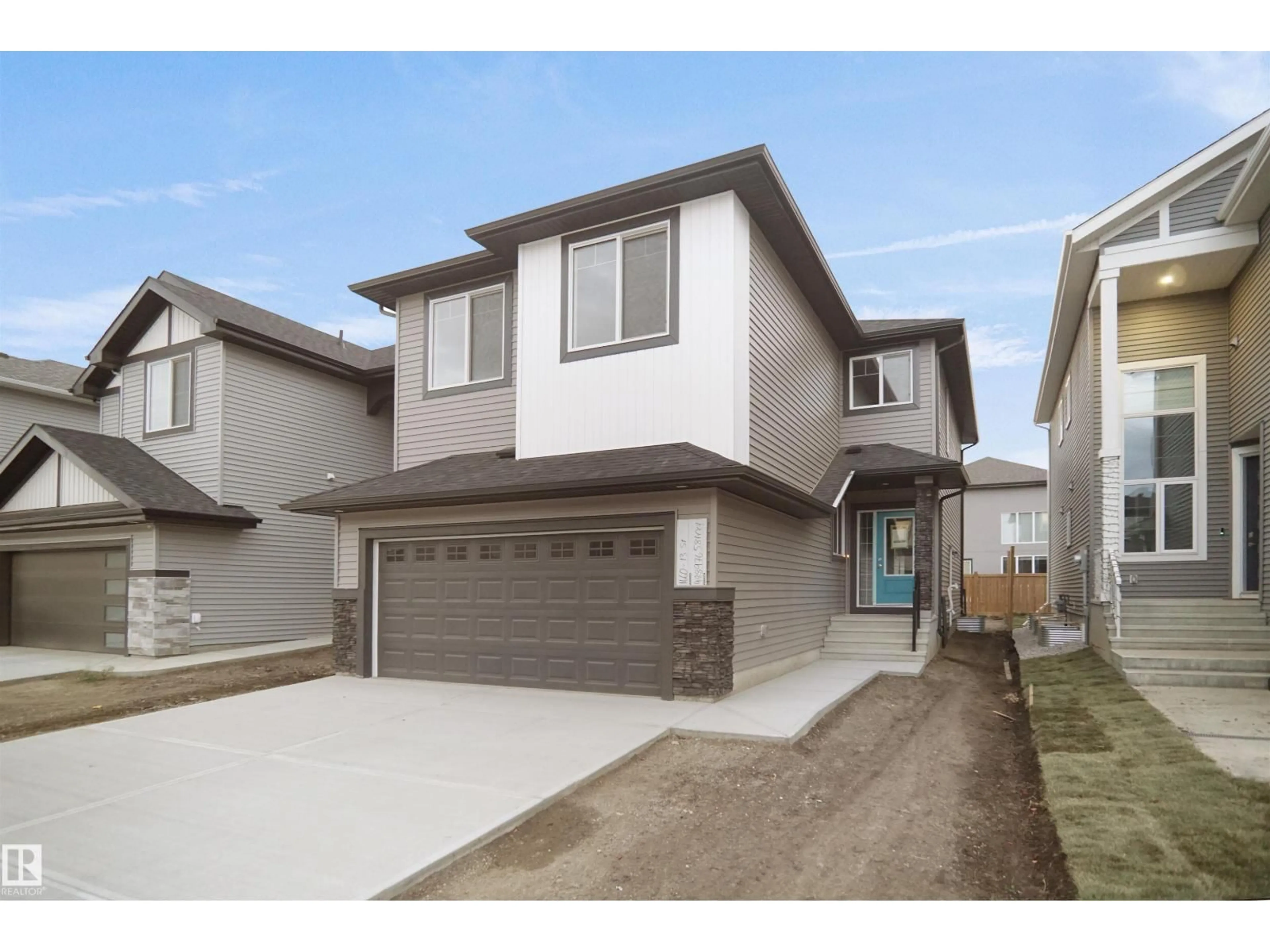 Home with vinyl exterior material, street for 20608 27 AV, Edmonton Alberta T6M1P2