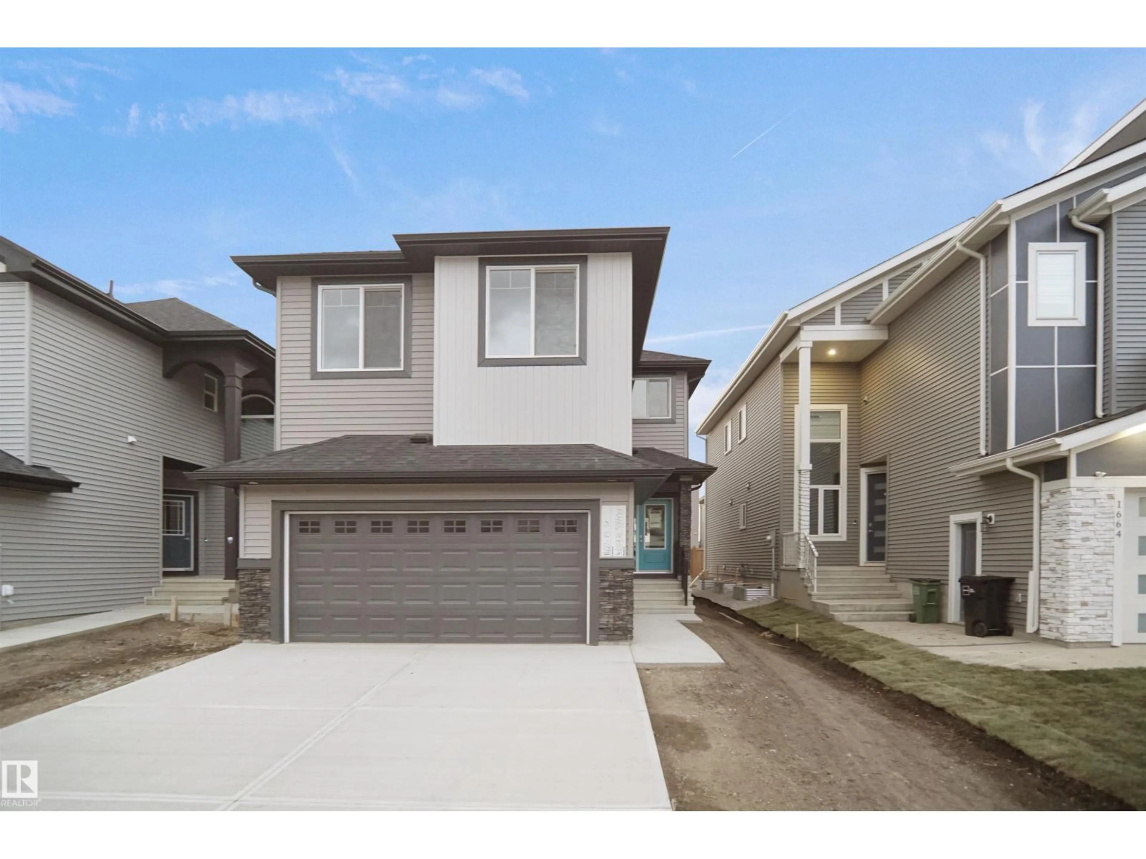 Home with vinyl exterior material, street for 20608 27 AV, Edmonton Alberta T6M1P2