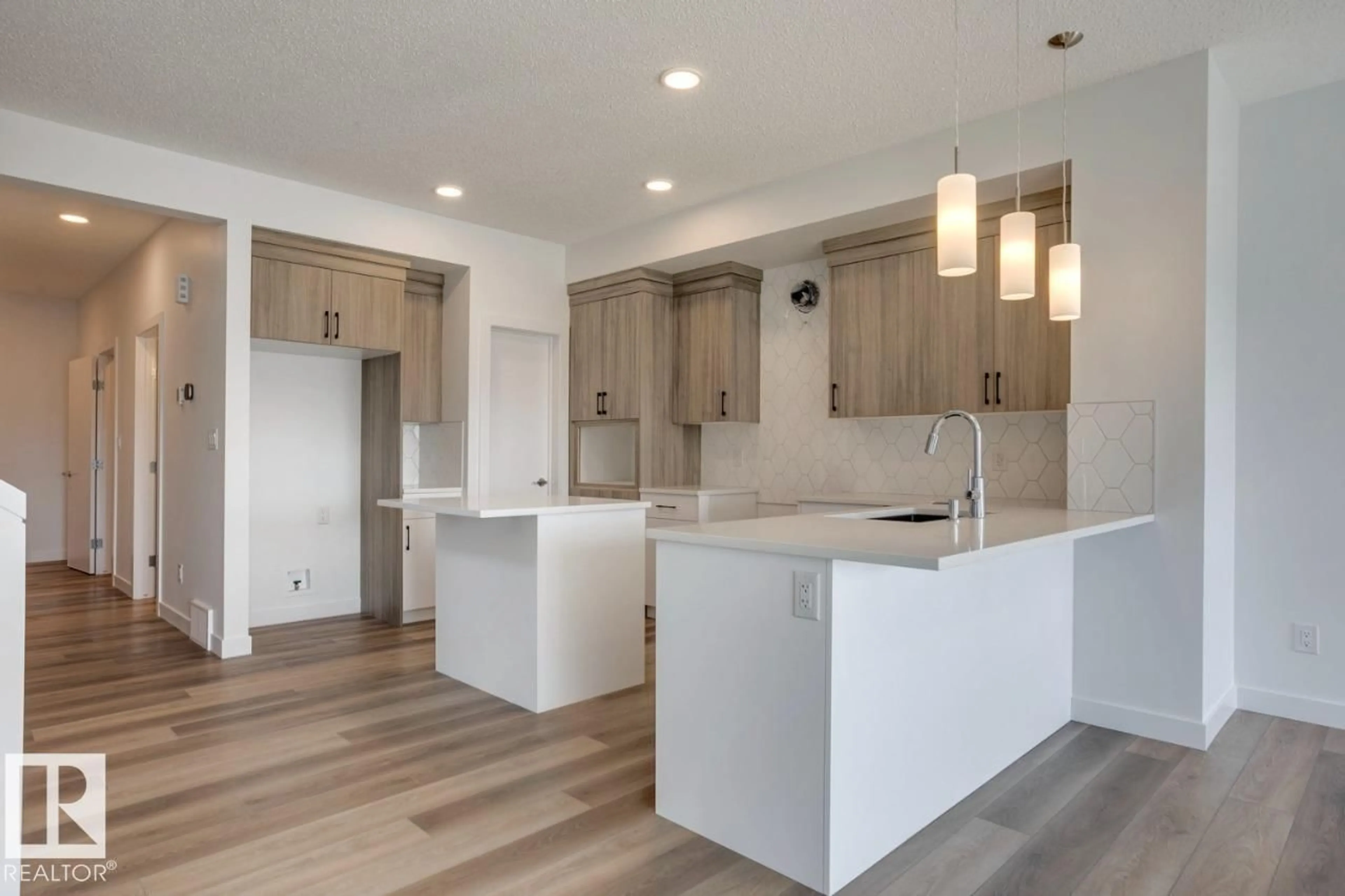 Open concept kitchen, unknown for 19019 20 AV, Edmonton Alberta T6M3E8