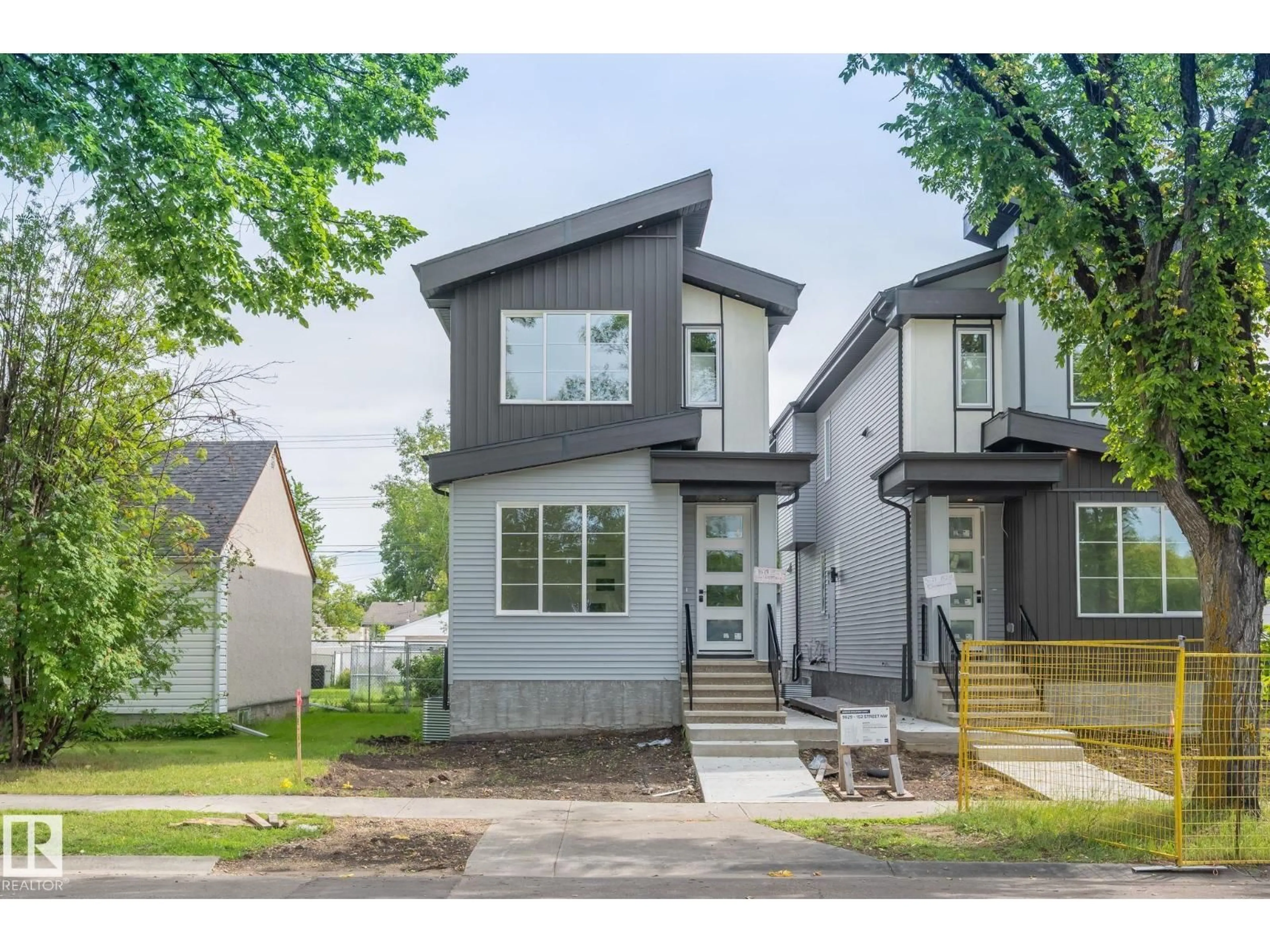 Home with vinyl exterior material, street for NW - 9629 152 ST, Edmonton Alberta T5W1W7