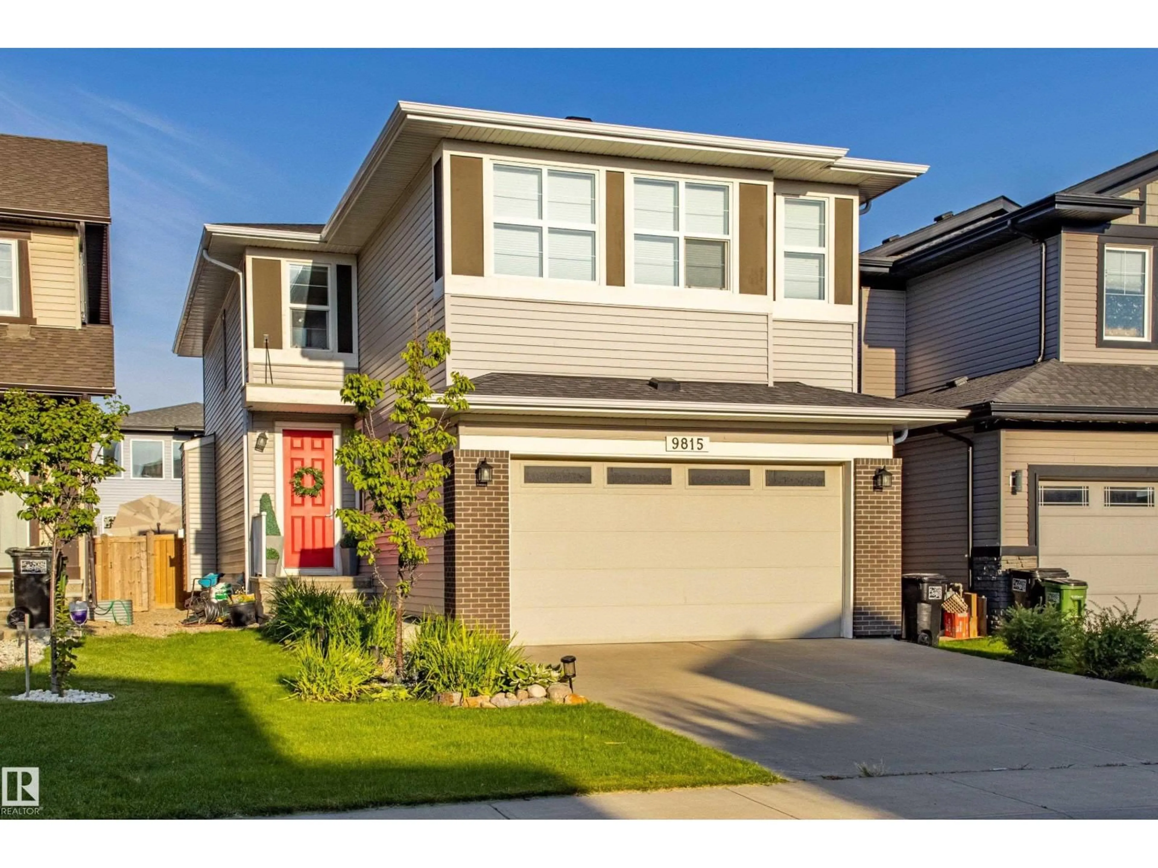 Home with vinyl exterior material, street for NW - 9815 225 ST, Edmonton Alberta T5T7C1