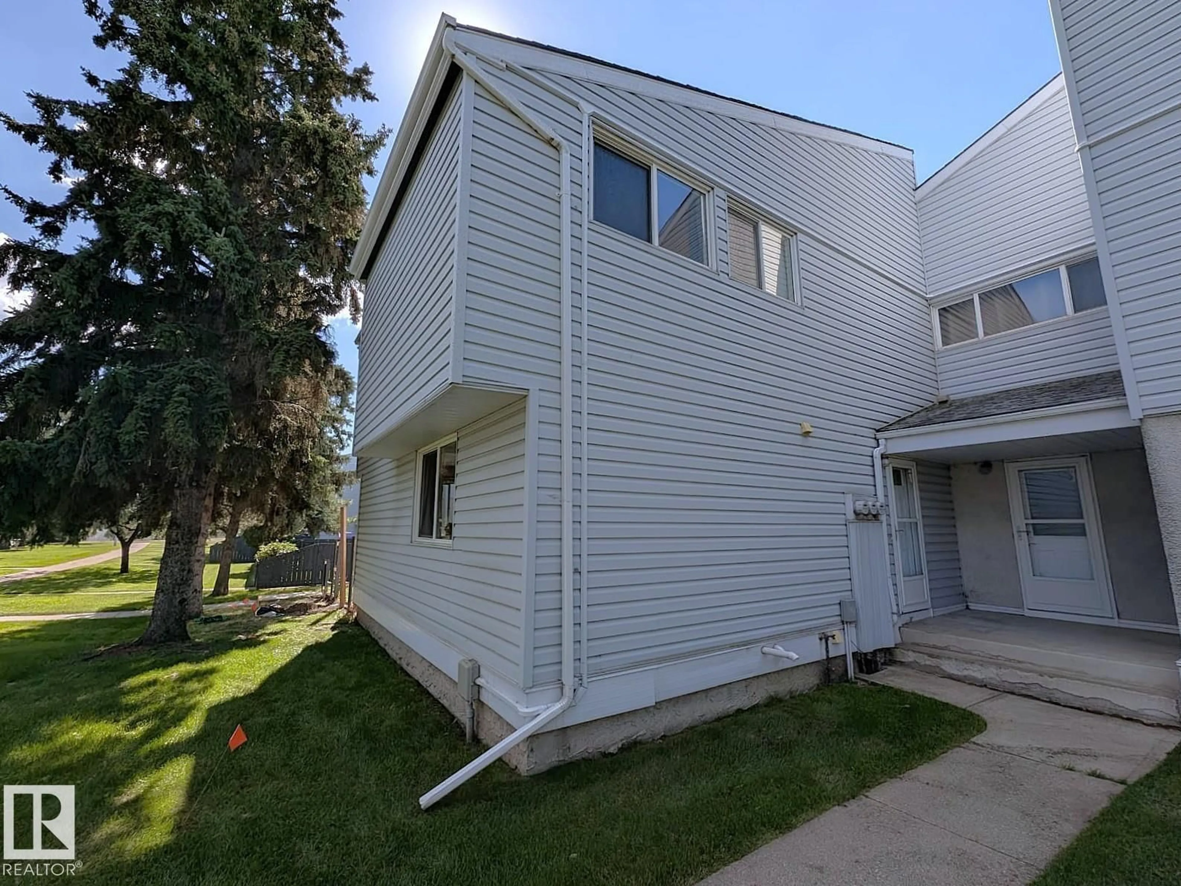 Home with vinyl exterior material, street for 61 MCLEOD PL, Edmonton Alberta T5A3A8