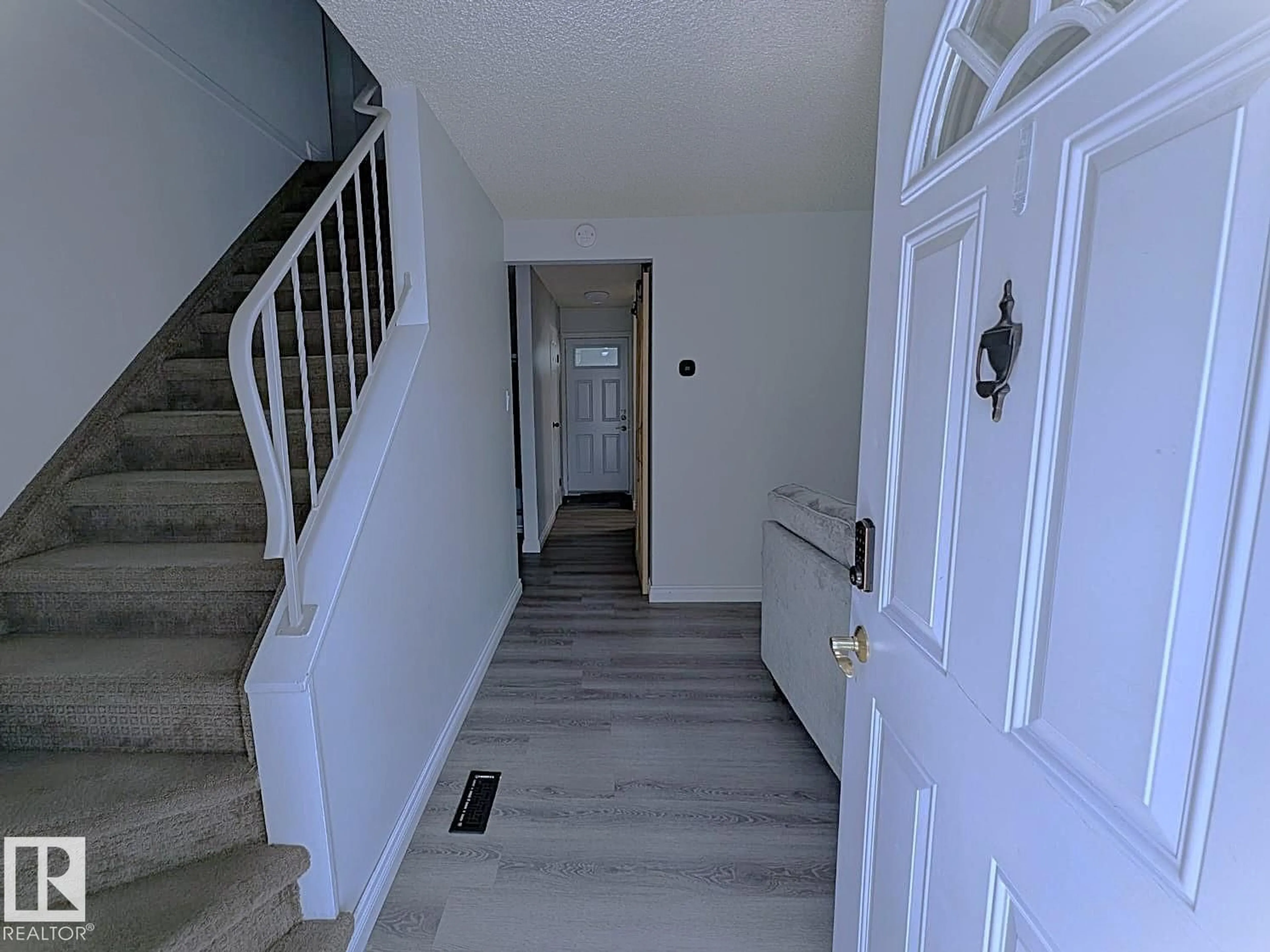 Indoor foyer for 61 MCLEOD PL, Edmonton Alberta T5A3A8