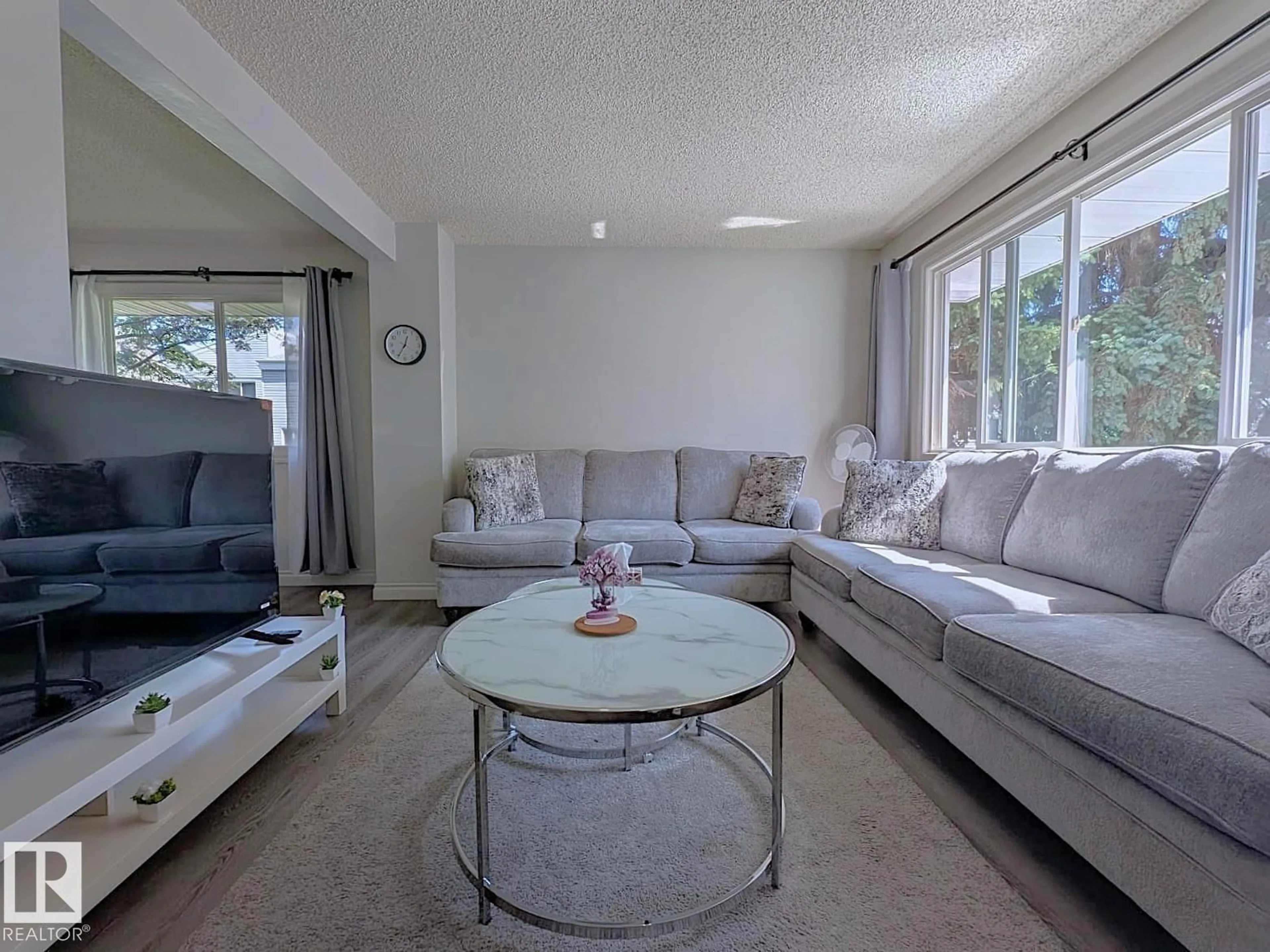 Living room with furniture, unknown for 61 MCLEOD PL, Edmonton Alberta T5A3A8