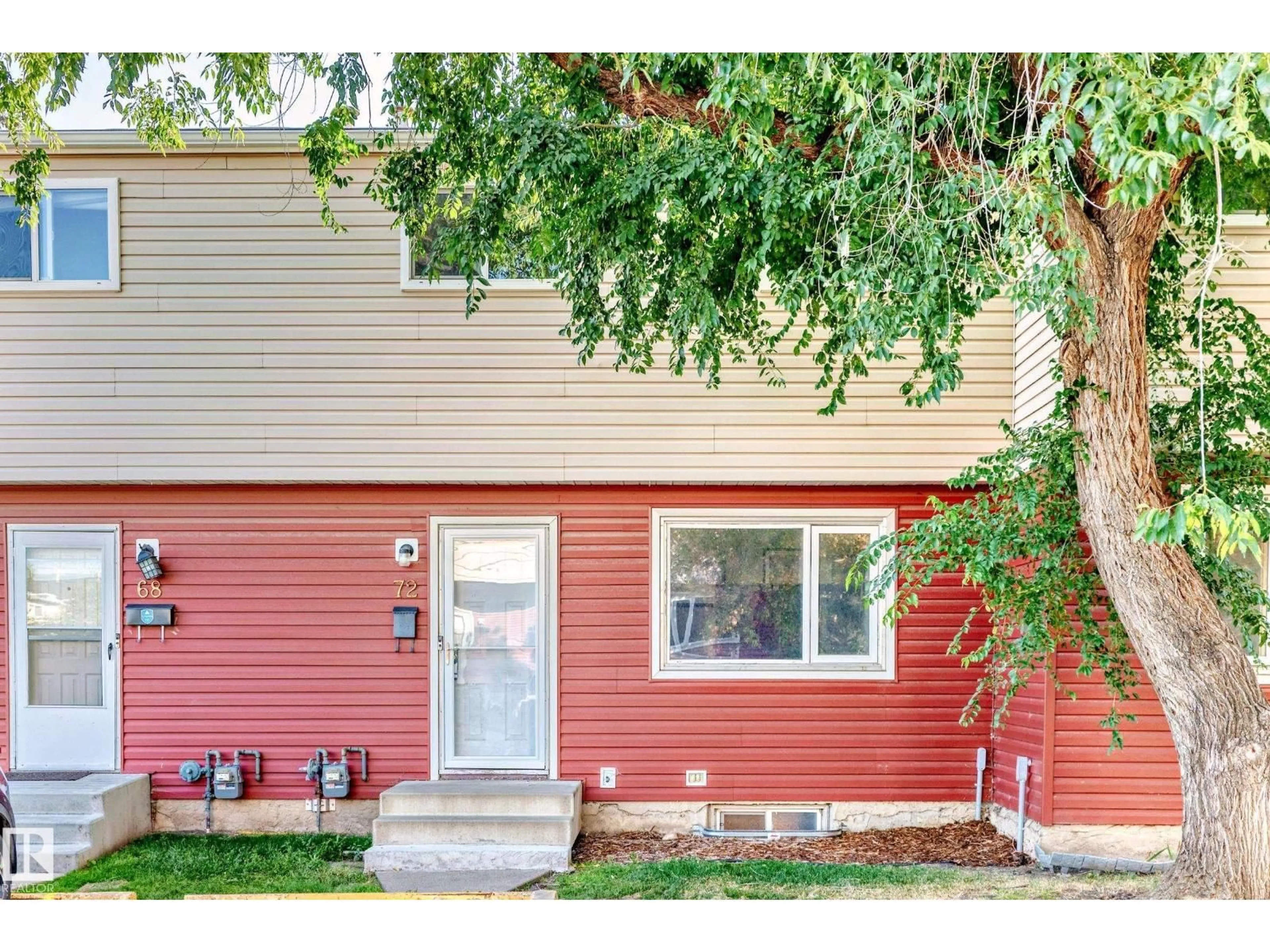 Home with vinyl exterior material, street for 72 HABITAT CR, Edmonton Alberta T5A2X7