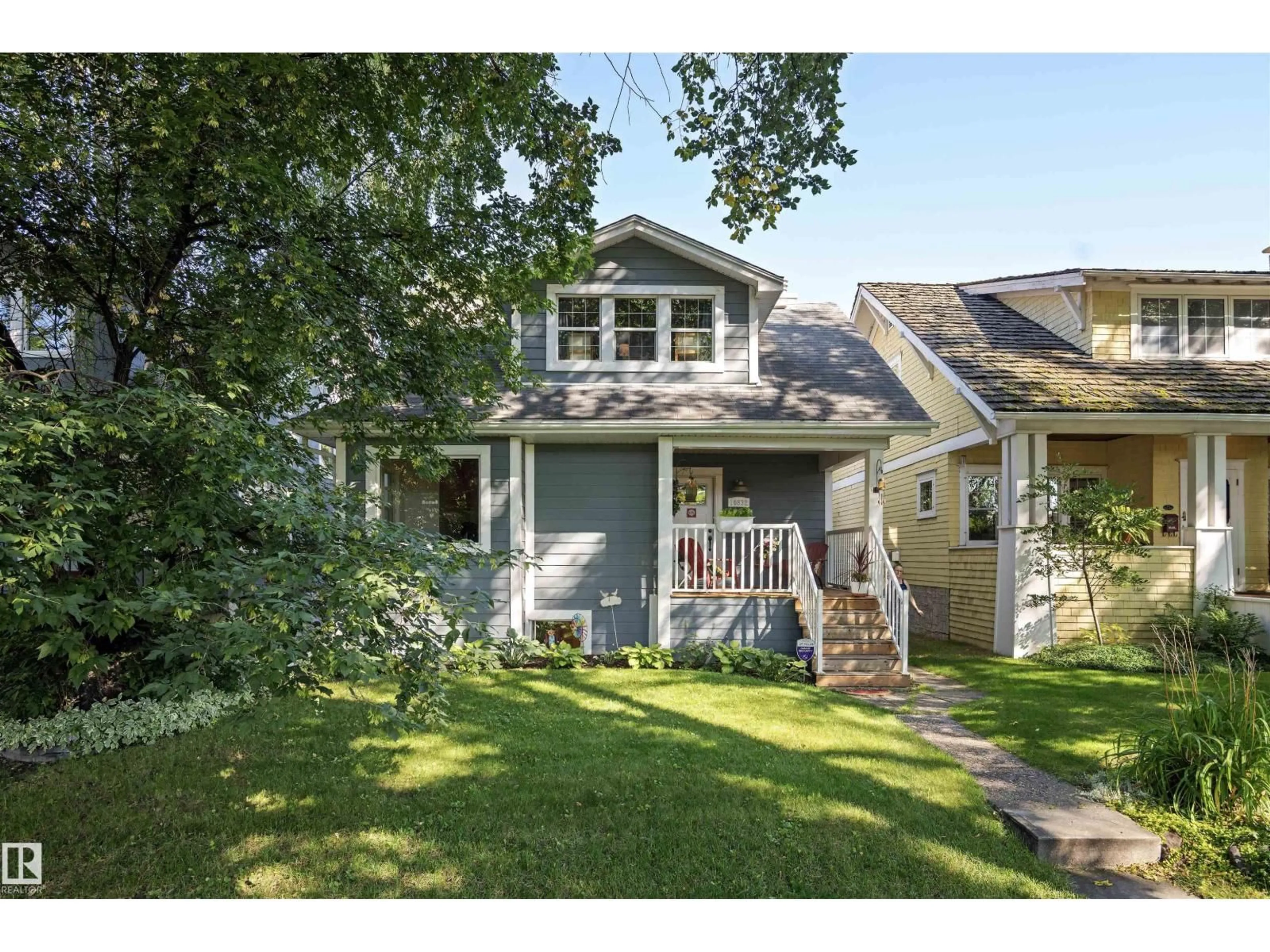 Home with vinyl exterior material, street for 10832 79 AV, Edmonton Alberta T6E1S5