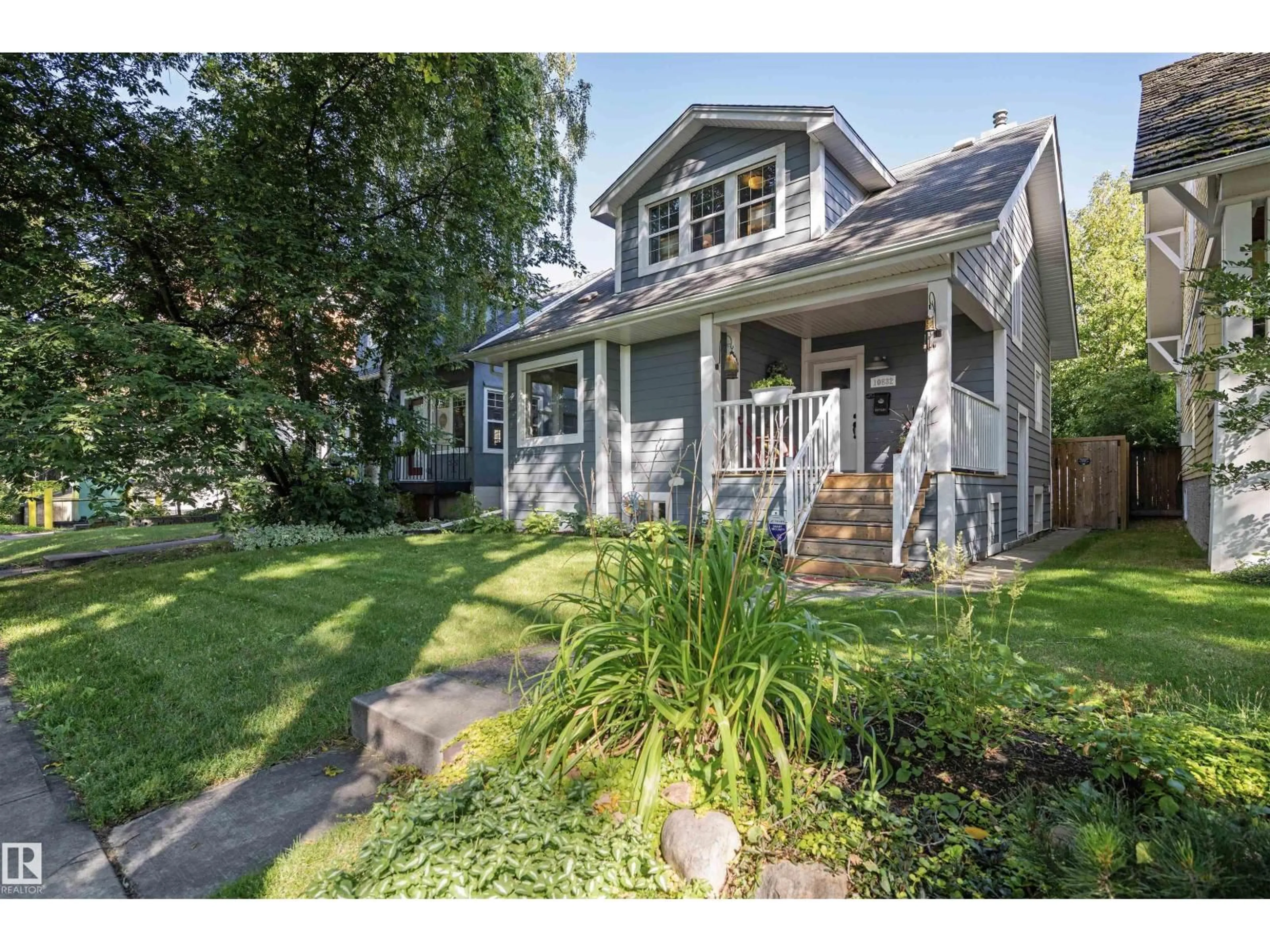 Home with vinyl exterior material, street for 10832 79 AV, Edmonton Alberta T6E1S5