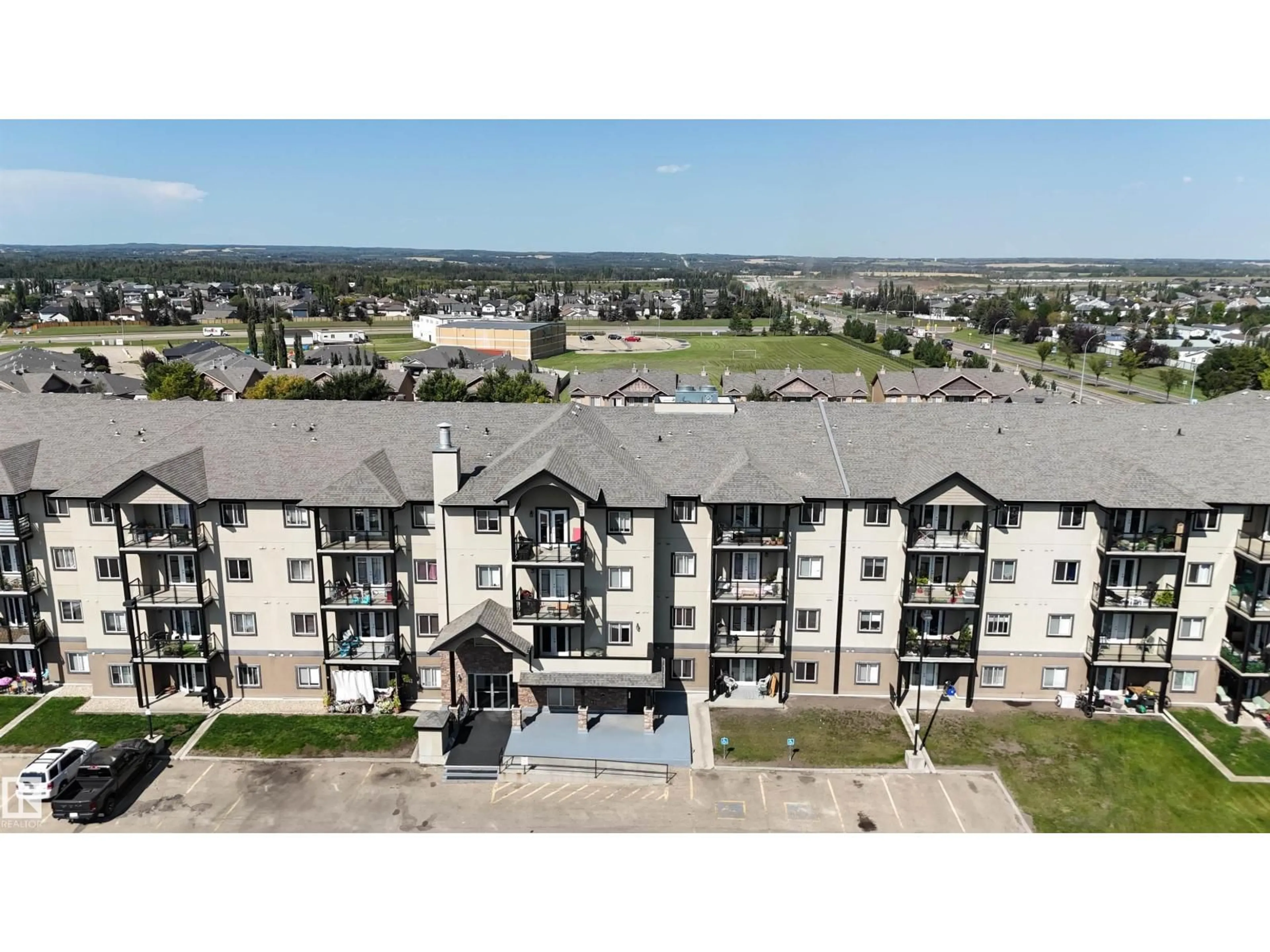 A pic from outside/outdoor area/front of a property/back of a property/a pic from drone, unknown for 233 SPRUCE RIDGE RD, Spruce Grove Alberta T7X0H6