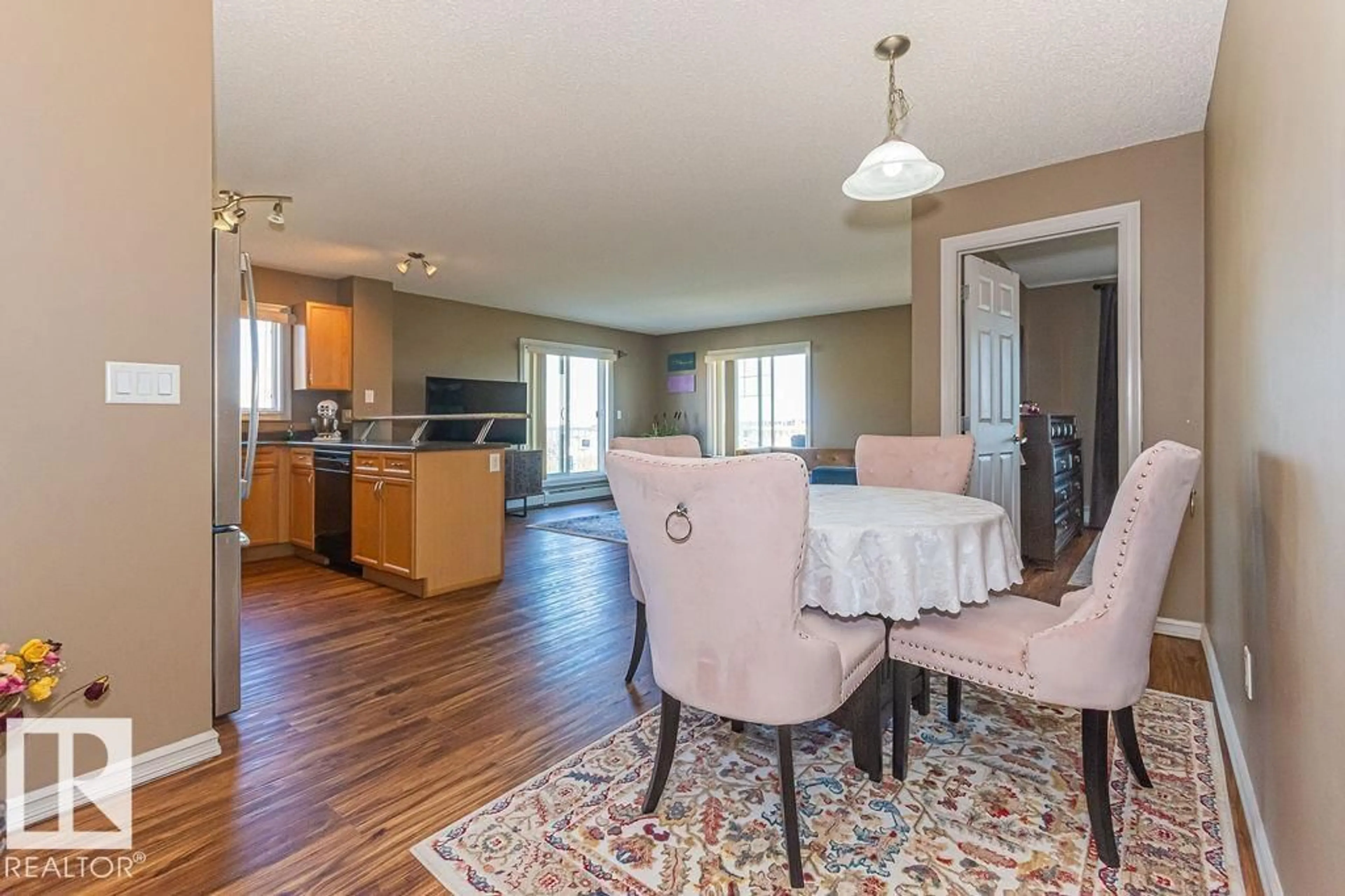 Dining room, wood/laminate floor for 13710 - 418 150 AV, Edmonton Alberta T6V0B2