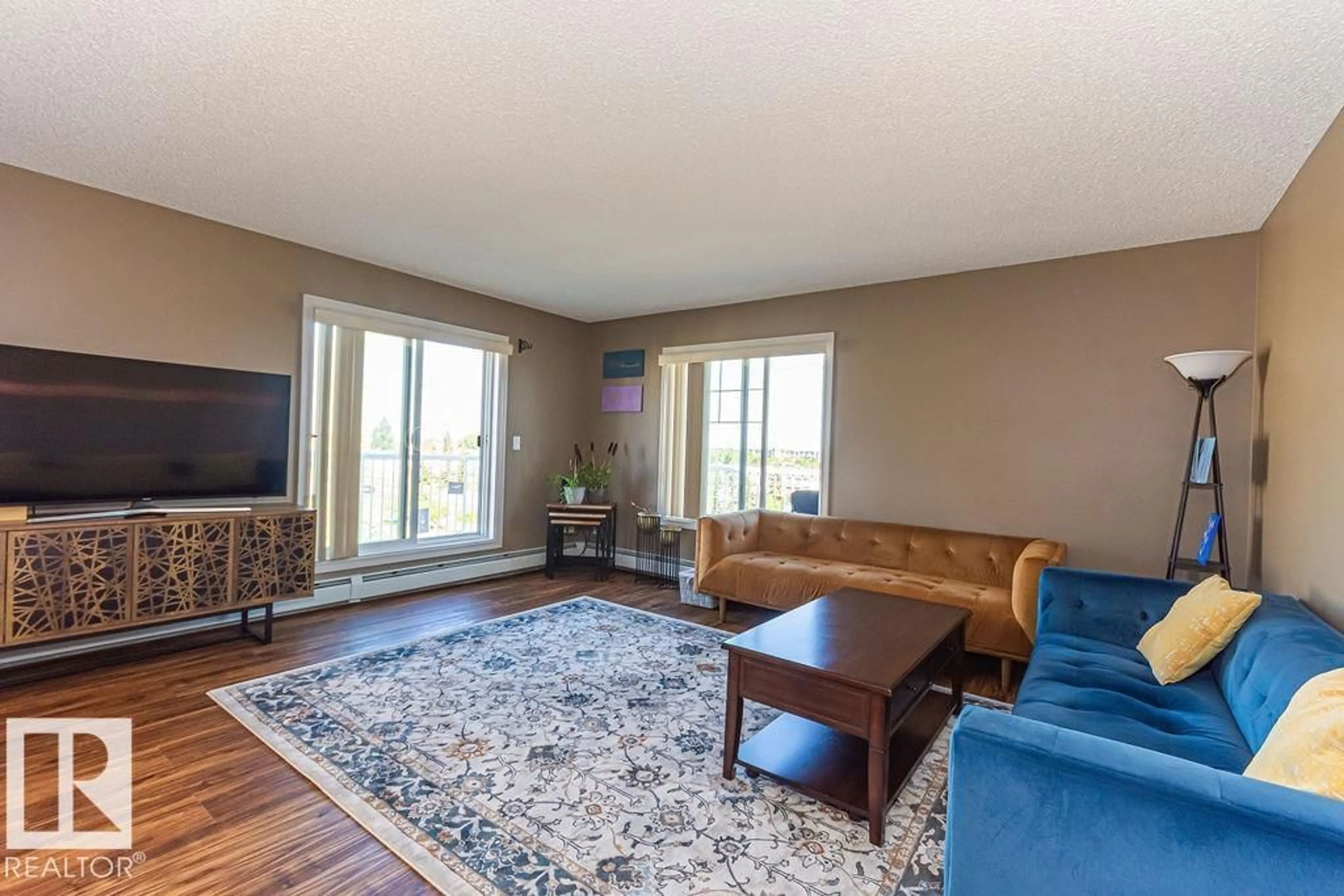 Living room with furniture, unknown for 13710 - 418 150 AV, Edmonton Alberta T6V0B2