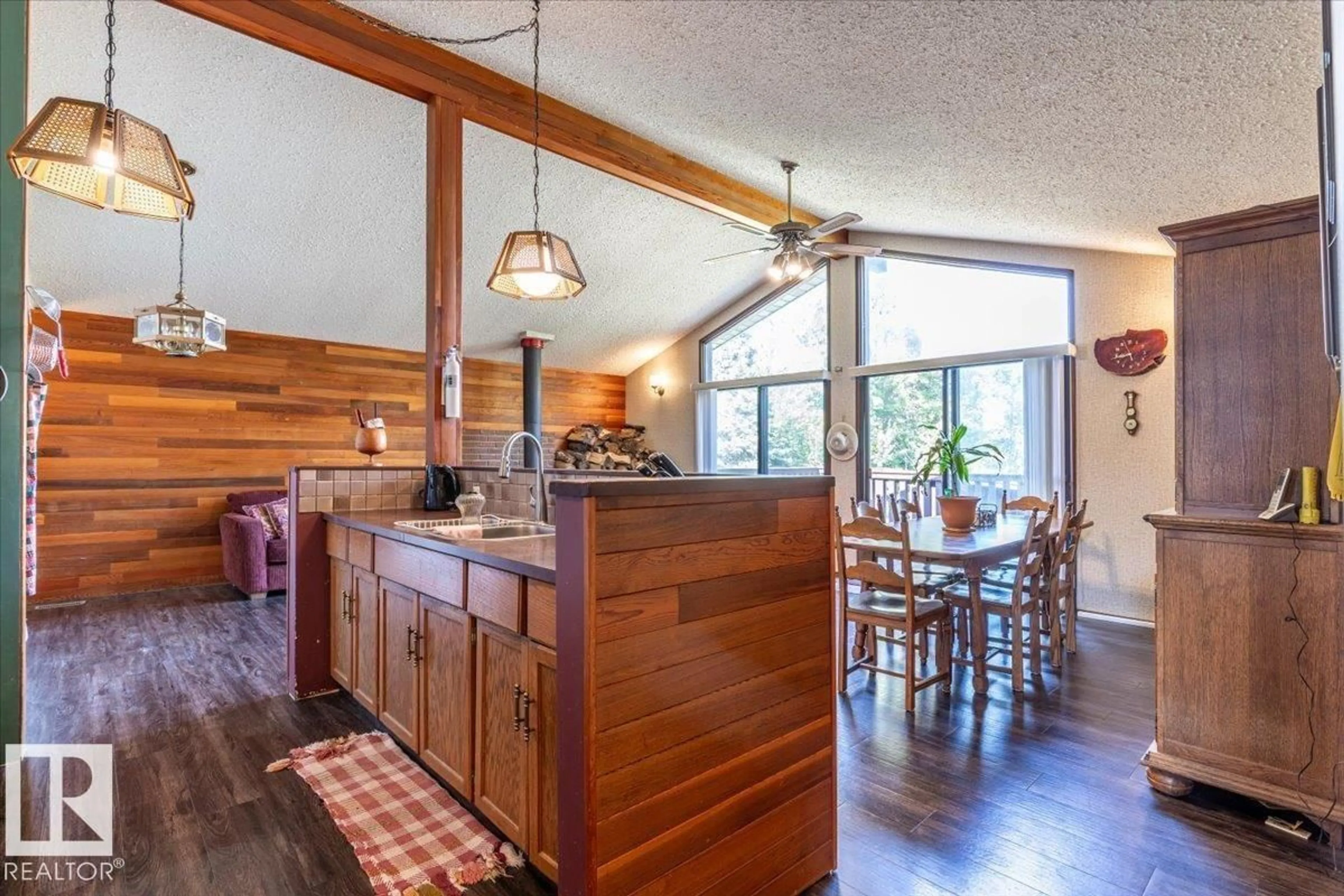 Open concept kitchen, wood/laminate floor for 271022 - 214 TWP ROAD 480, Rural Wetaskiwin County Alberta T0C0V0