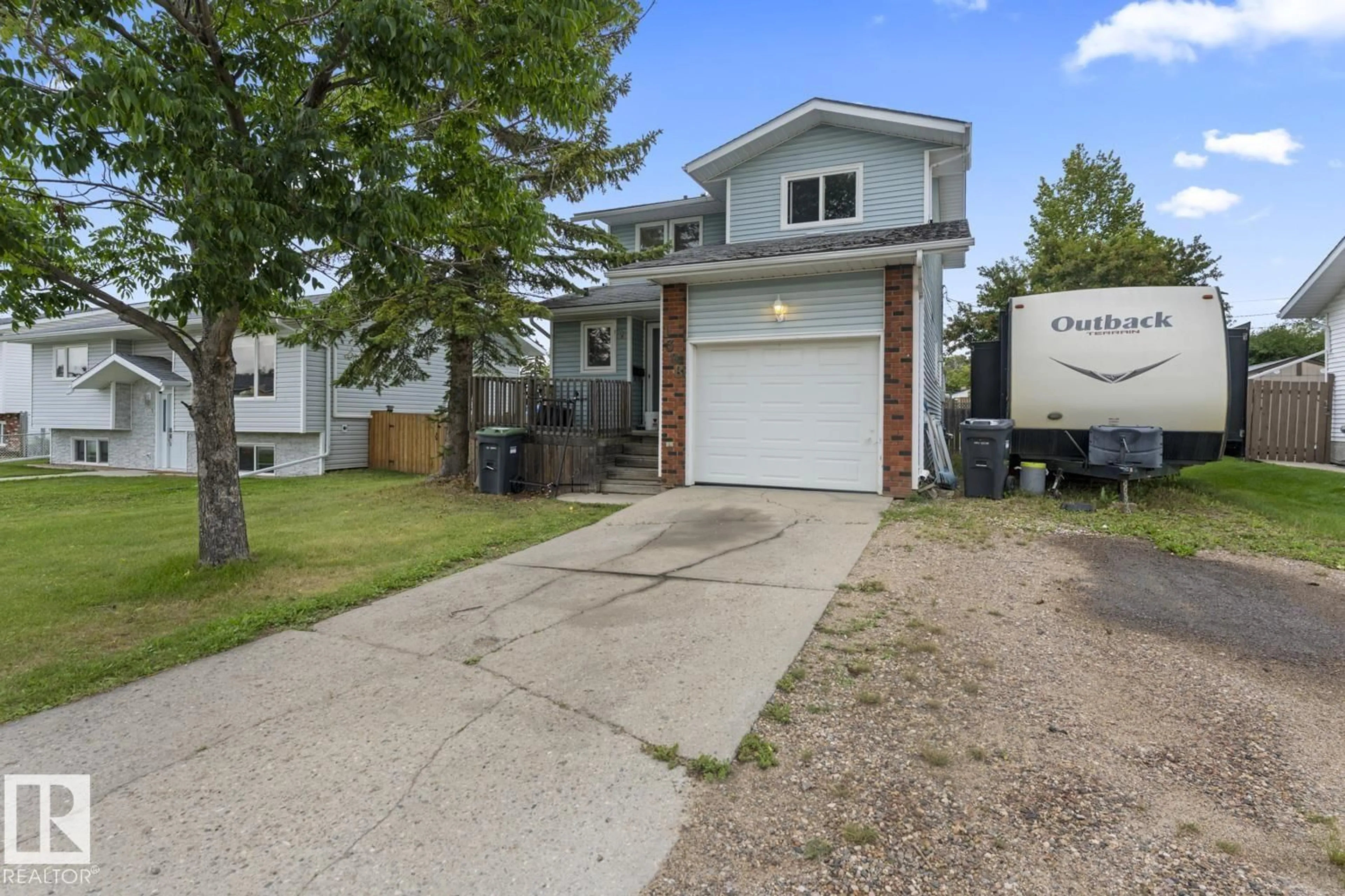 Home with vinyl exterior material, street for 1308 11 STREET ST, Cold Lake Alberta T9M1J5