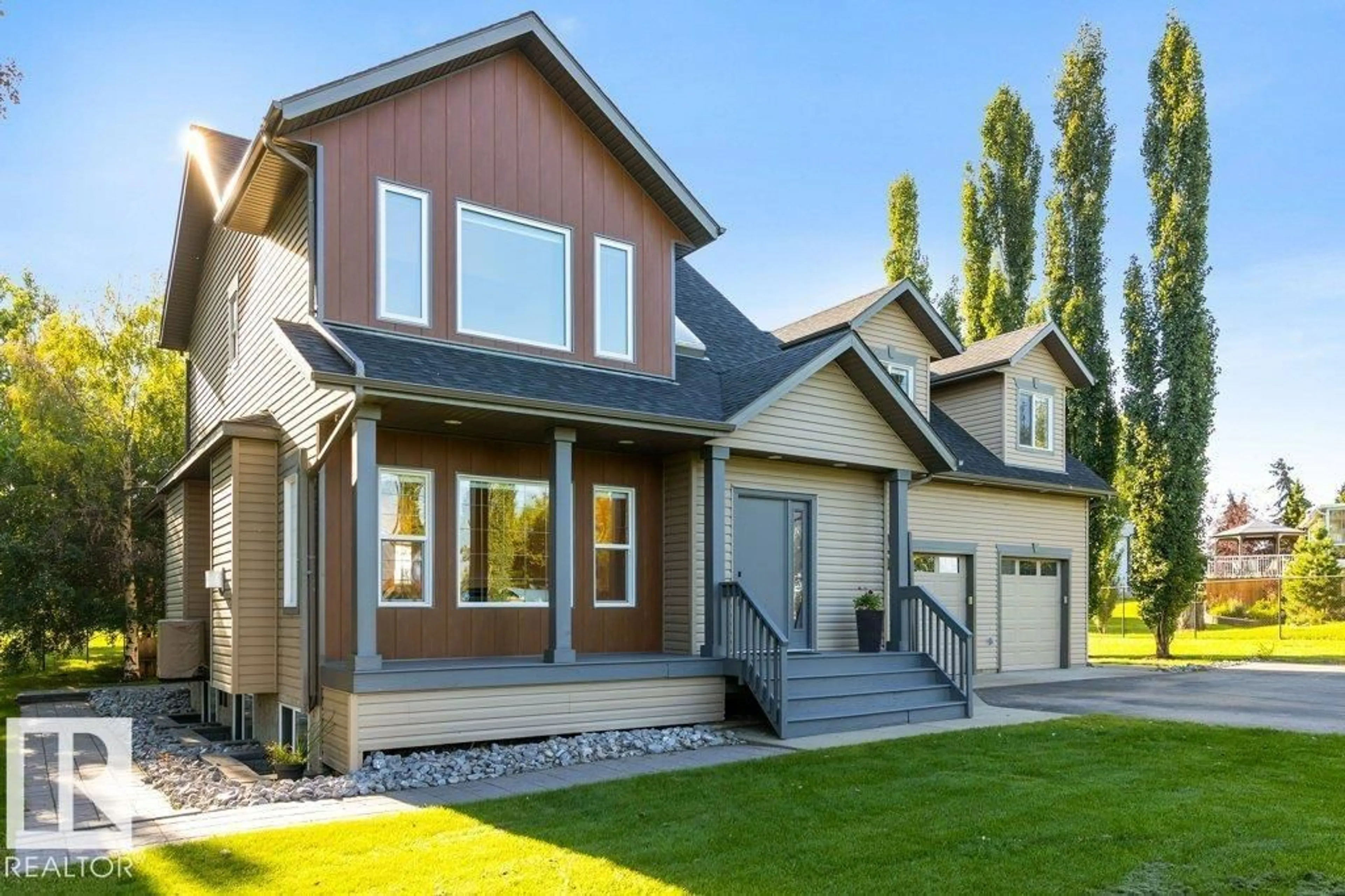 Home with vinyl exterior material, street for 51 RGE ROAD 275, Rural Parkland County Alberta T7X3V2