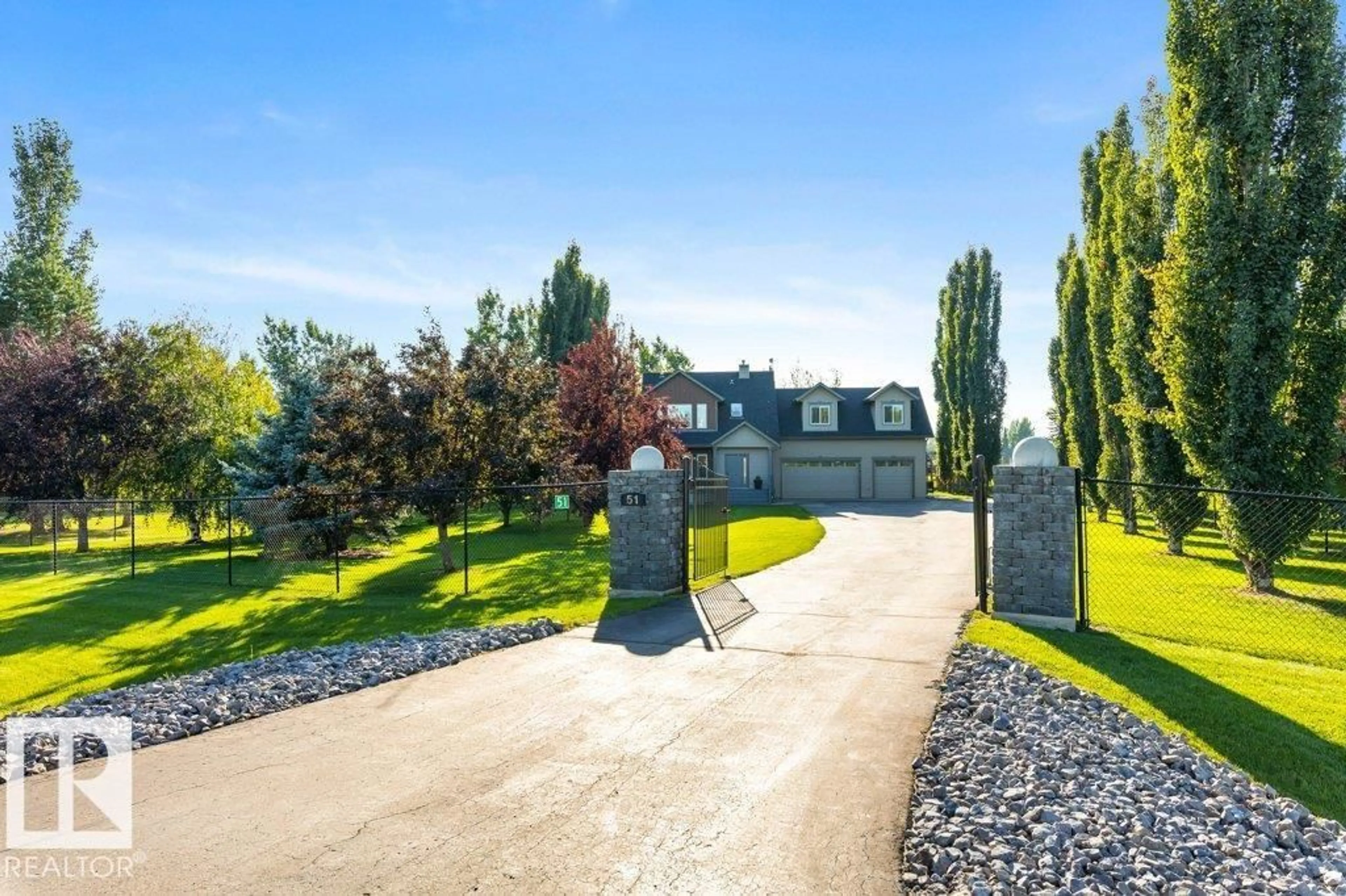 A pic from outside/outdoor area/front of a property/back of a property/a pic from drone, mountain view for 51 RGE ROAD 275, Rural Parkland County Alberta T7X3V2