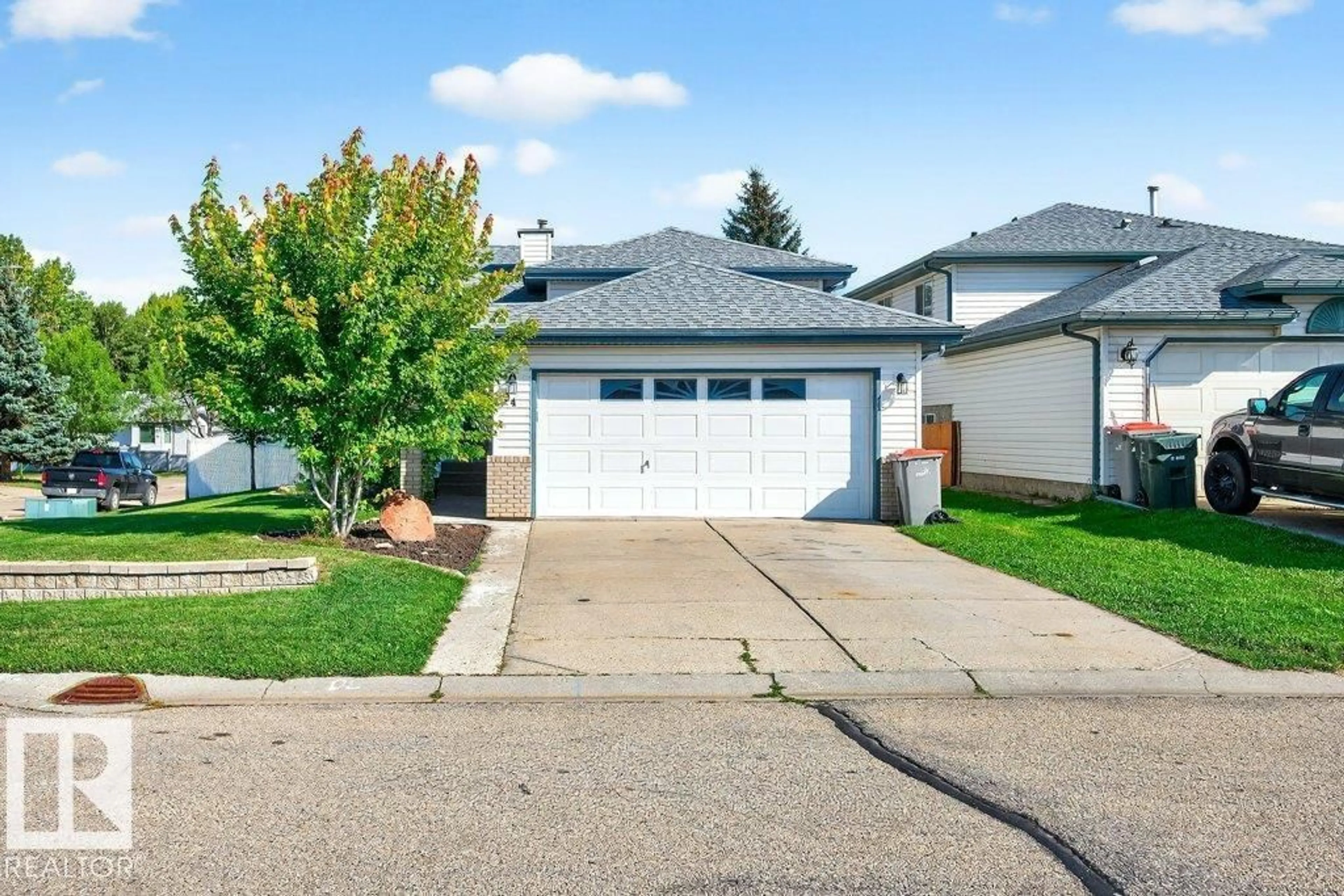 Home with vinyl exterior material, street for 94 LA COSTA FAIRWAY CL, Stony Plain Alberta T7Z2A5