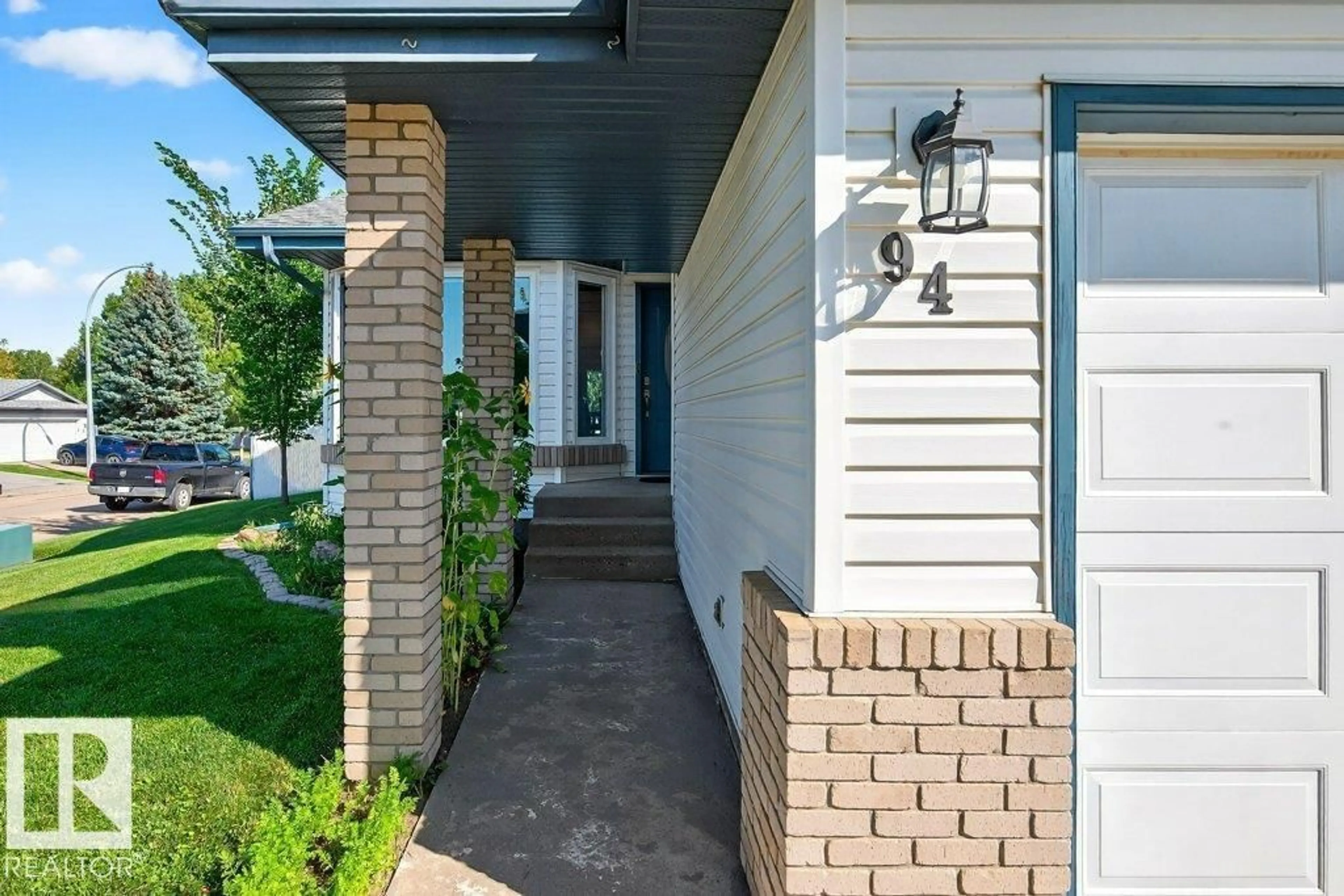 Home with brick exterior material, street for 94 LA COSTA FAIRWAY CL, Stony Plain Alberta T7Z2A5
