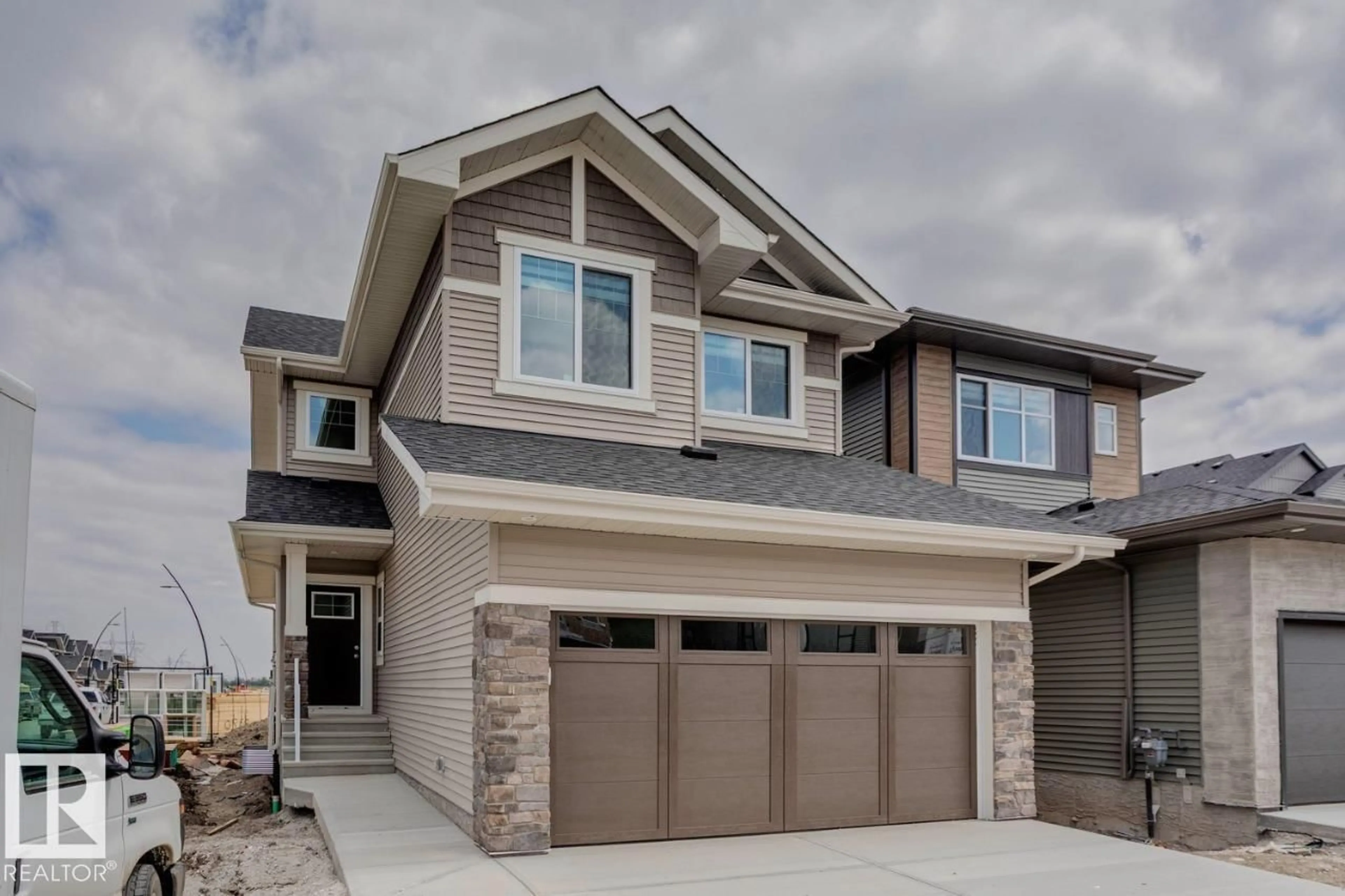 Home with brick exterior material, street for 2831 191 ST, Edmonton Alberta T6M3C3