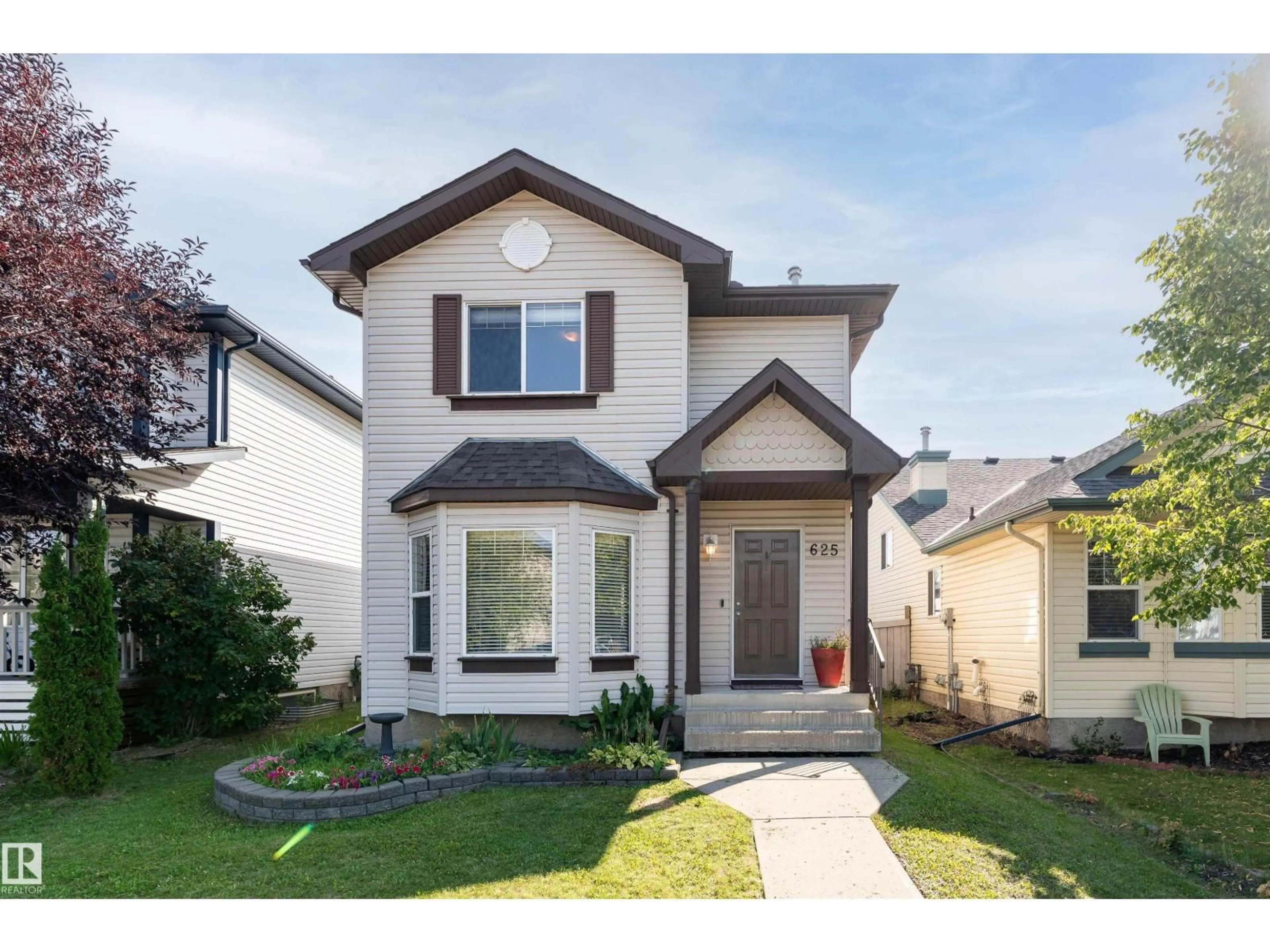 Home with vinyl exterior material, street for 625 88A ST, Edmonton Alberta T6X1C3