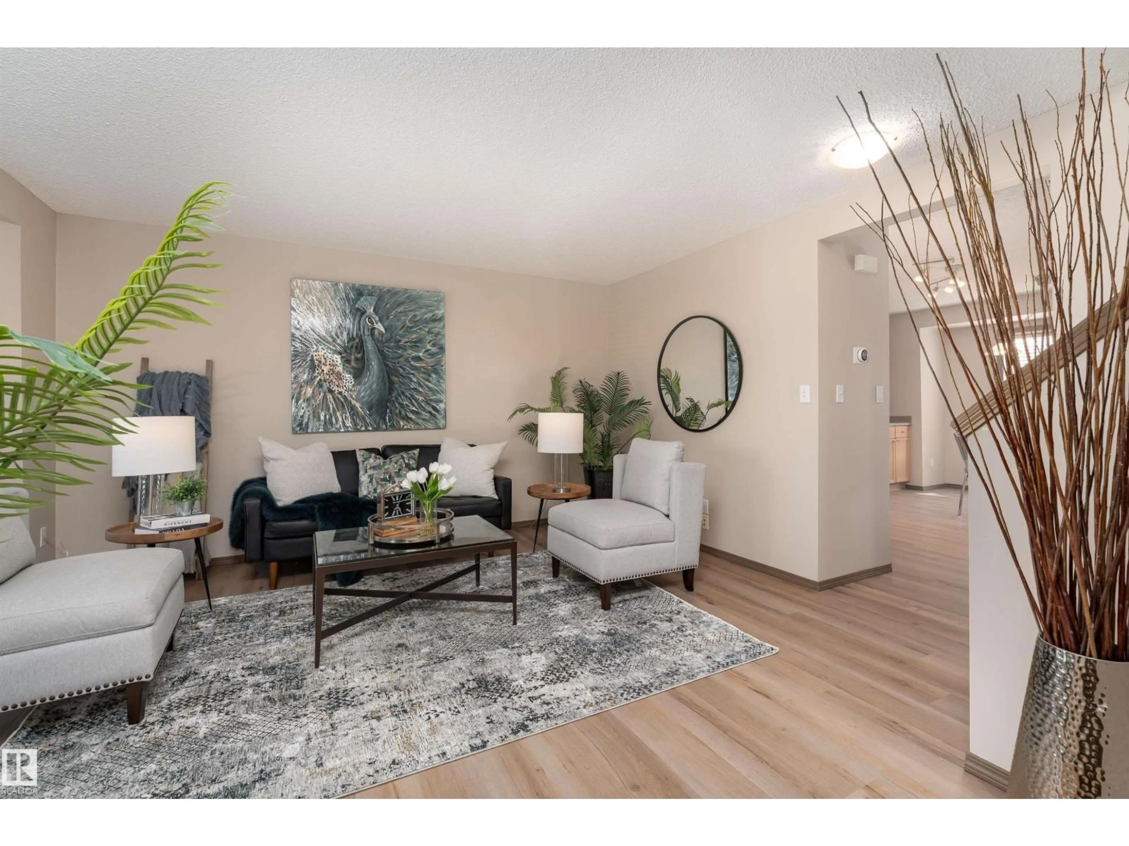 Living room with furniture, wood/laminate floor for 625 88A ST, Edmonton Alberta T6X1C3