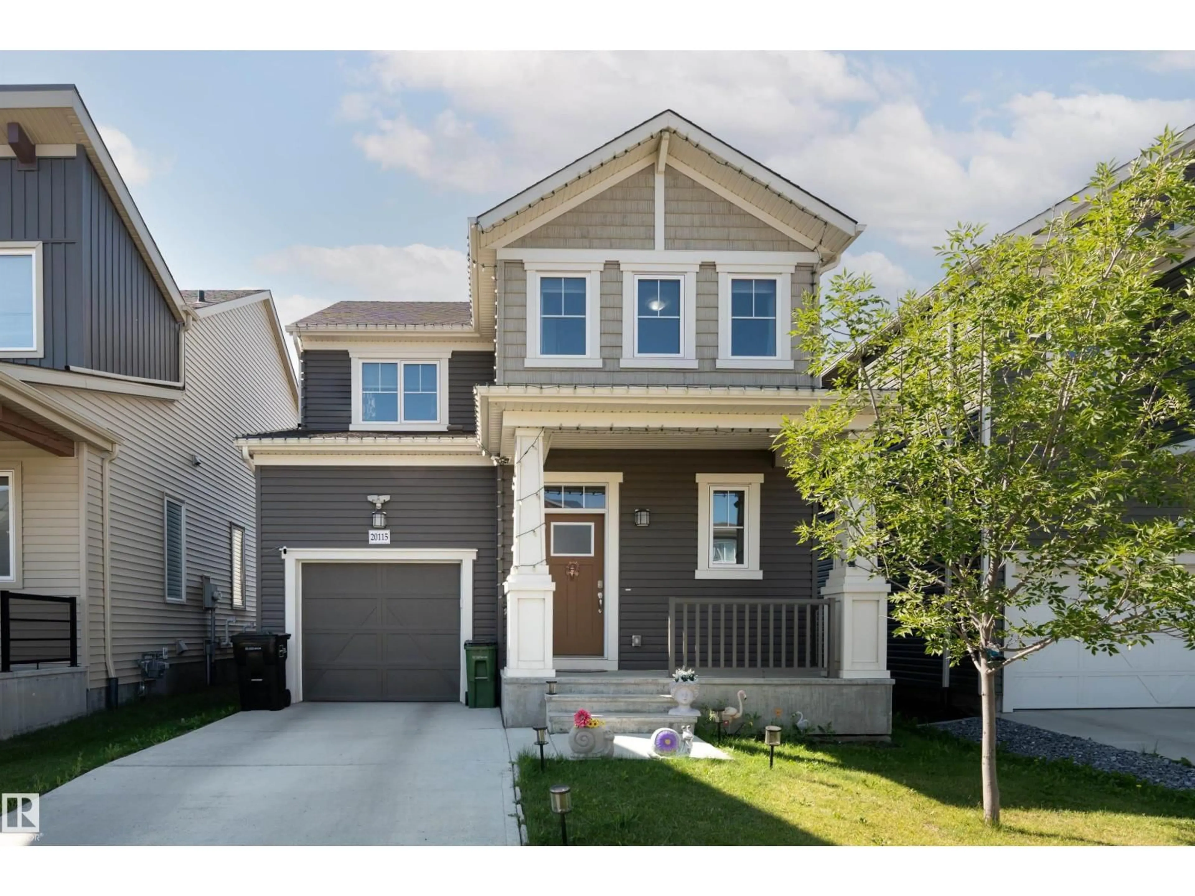 Home with vinyl exterior material, street for 20115 15 AV, Edmonton Alberta T6M1L6