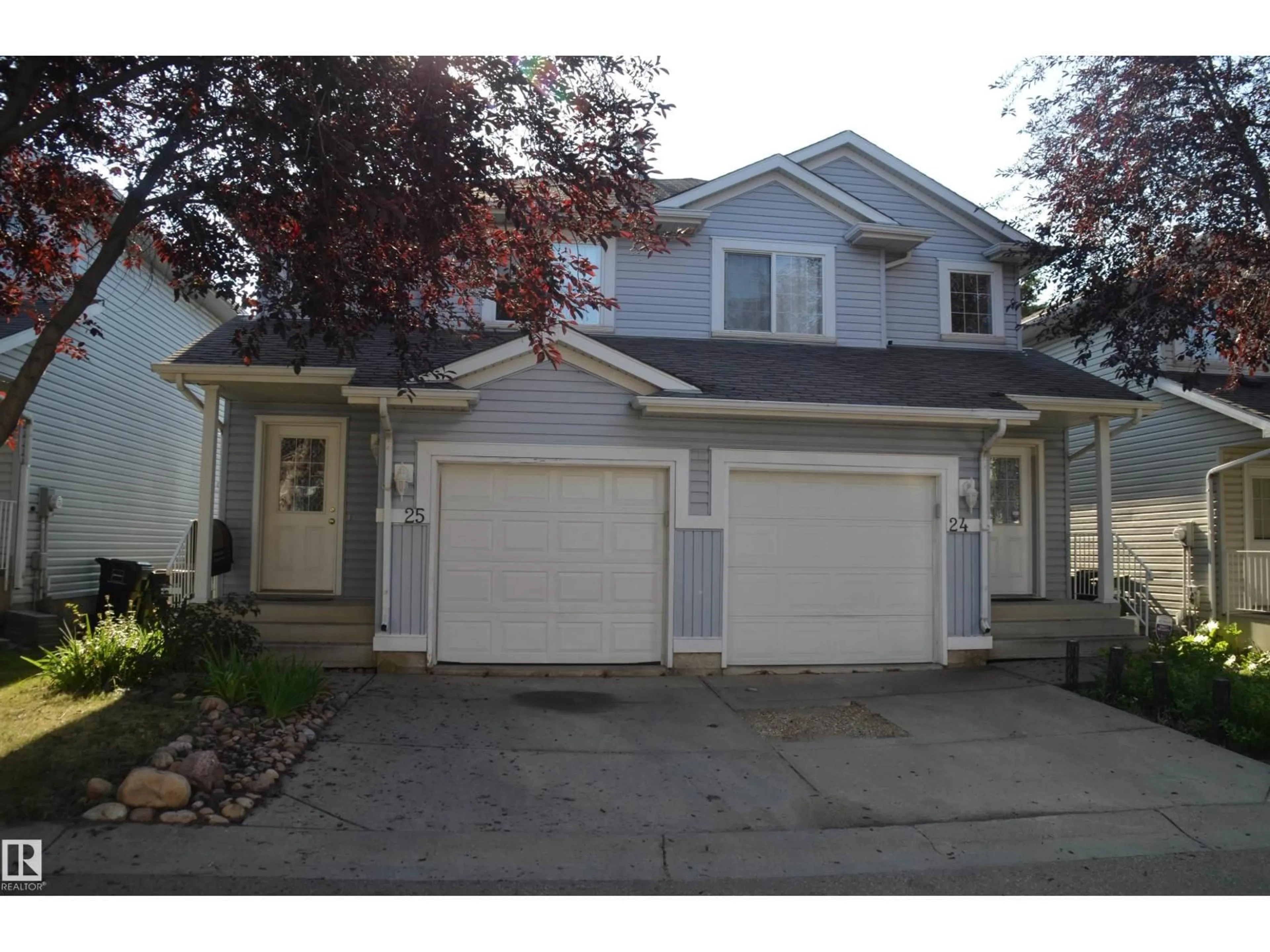 Home with vinyl exterior material, street for NW - 25 14603 MILLER BV, Edmonton Alberta T5Y3B6