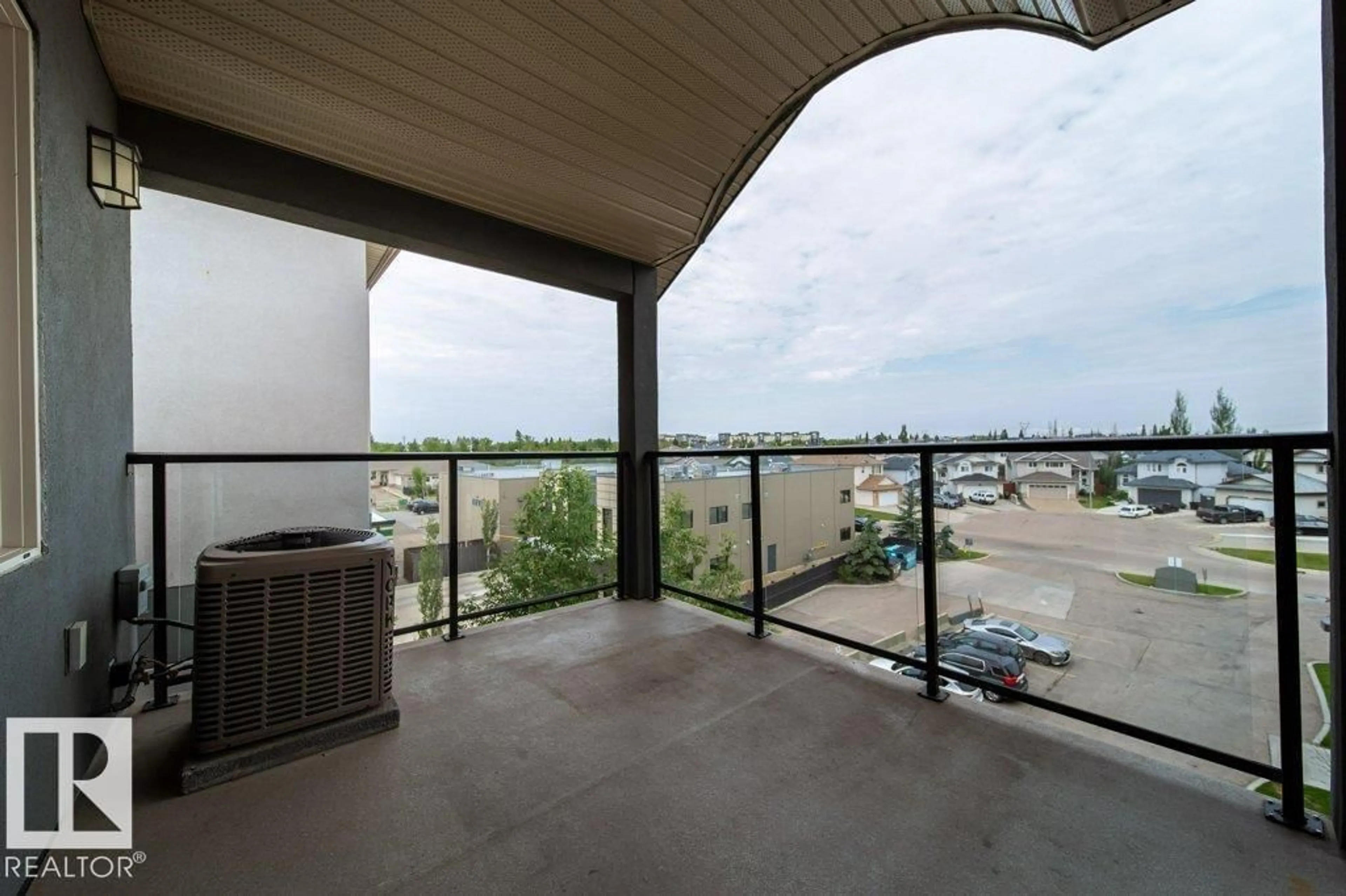Patio, city buildings view from balcony for #412 - 16235 51 ST, Edmonton Alberta T5Y0V3