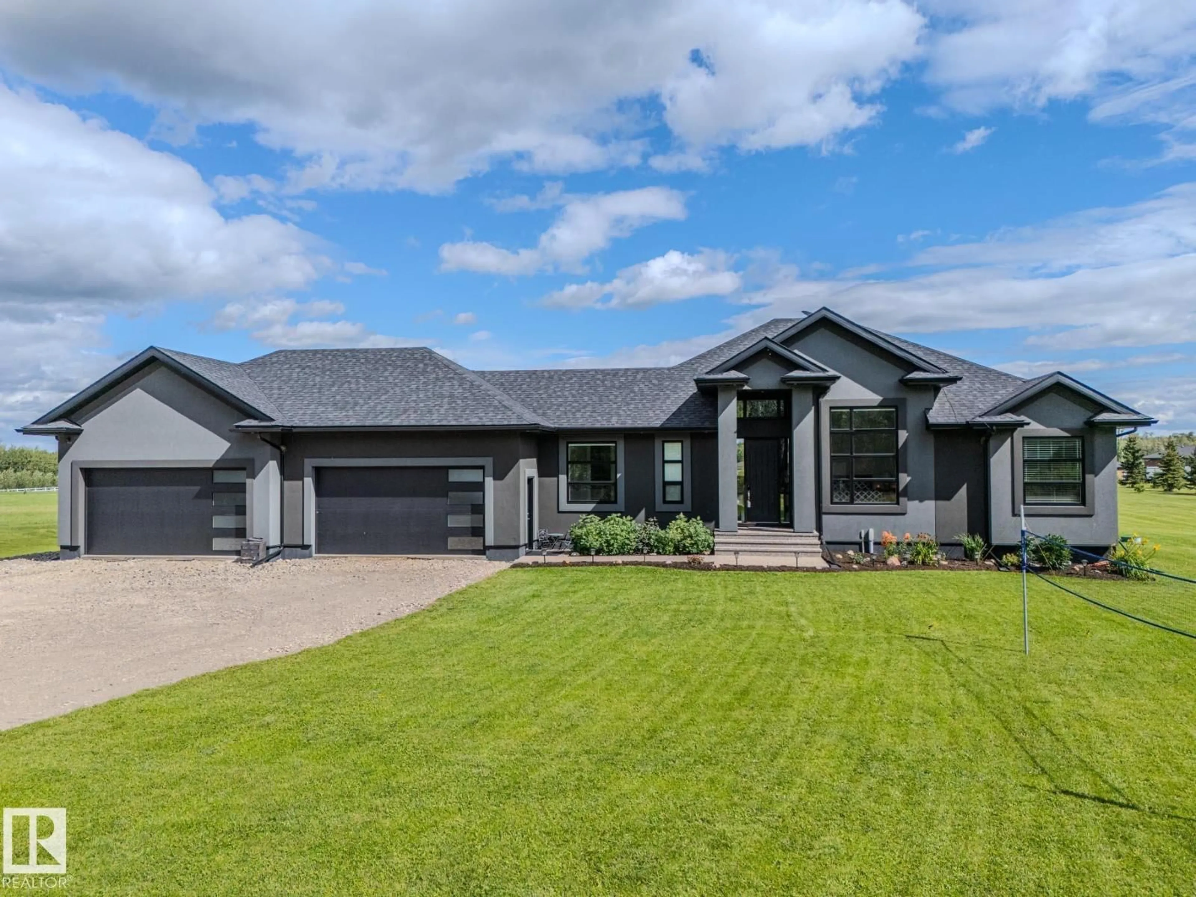 Home with vinyl exterior material, street for 110 - 21539 TWP ROAD 503 NE, Rural Leduc County Alberta T0B3M2