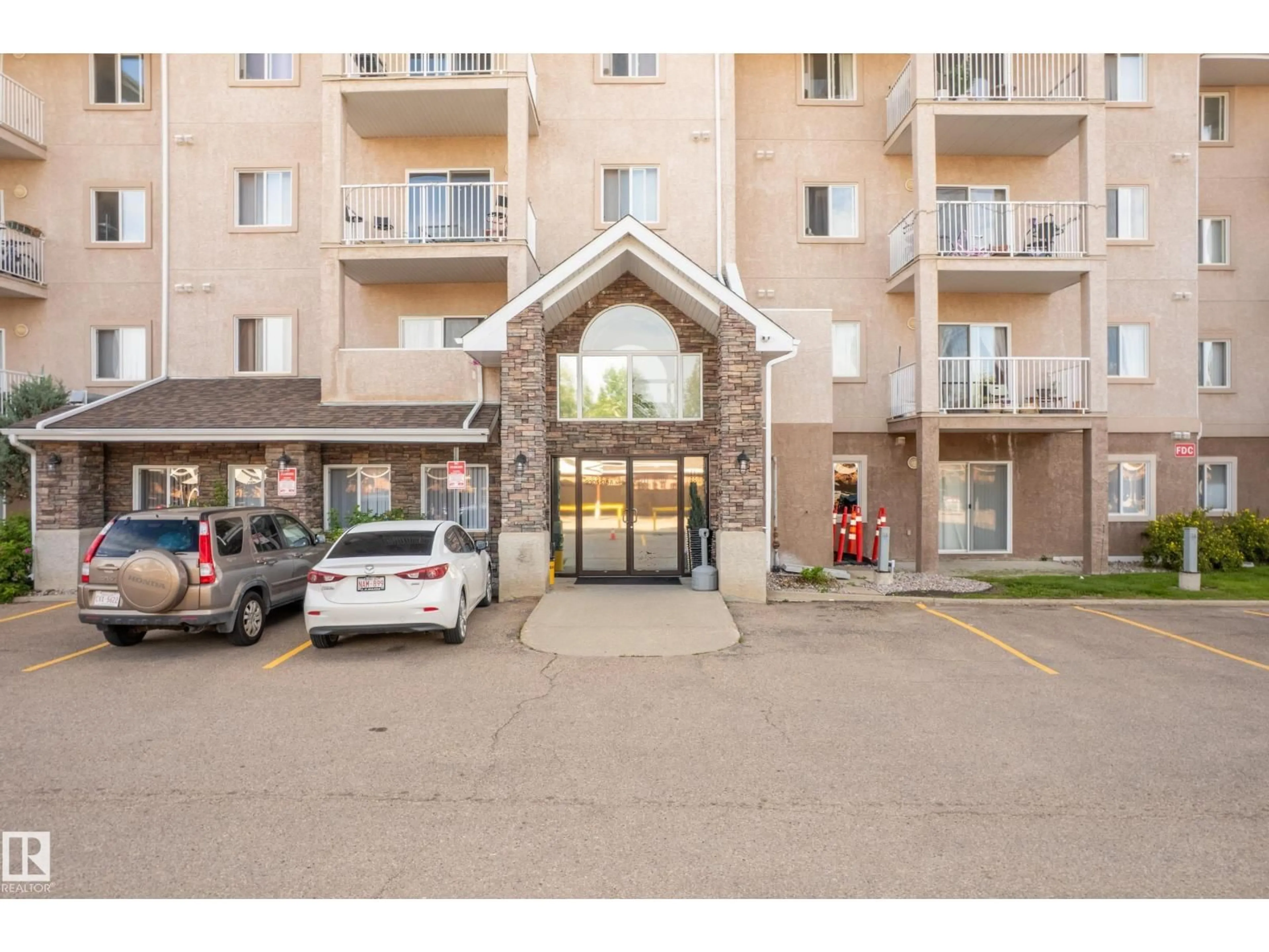 Indoor foyer for 420 - 2305 35A AV NW, Edmonton Alberta T6T1Z2