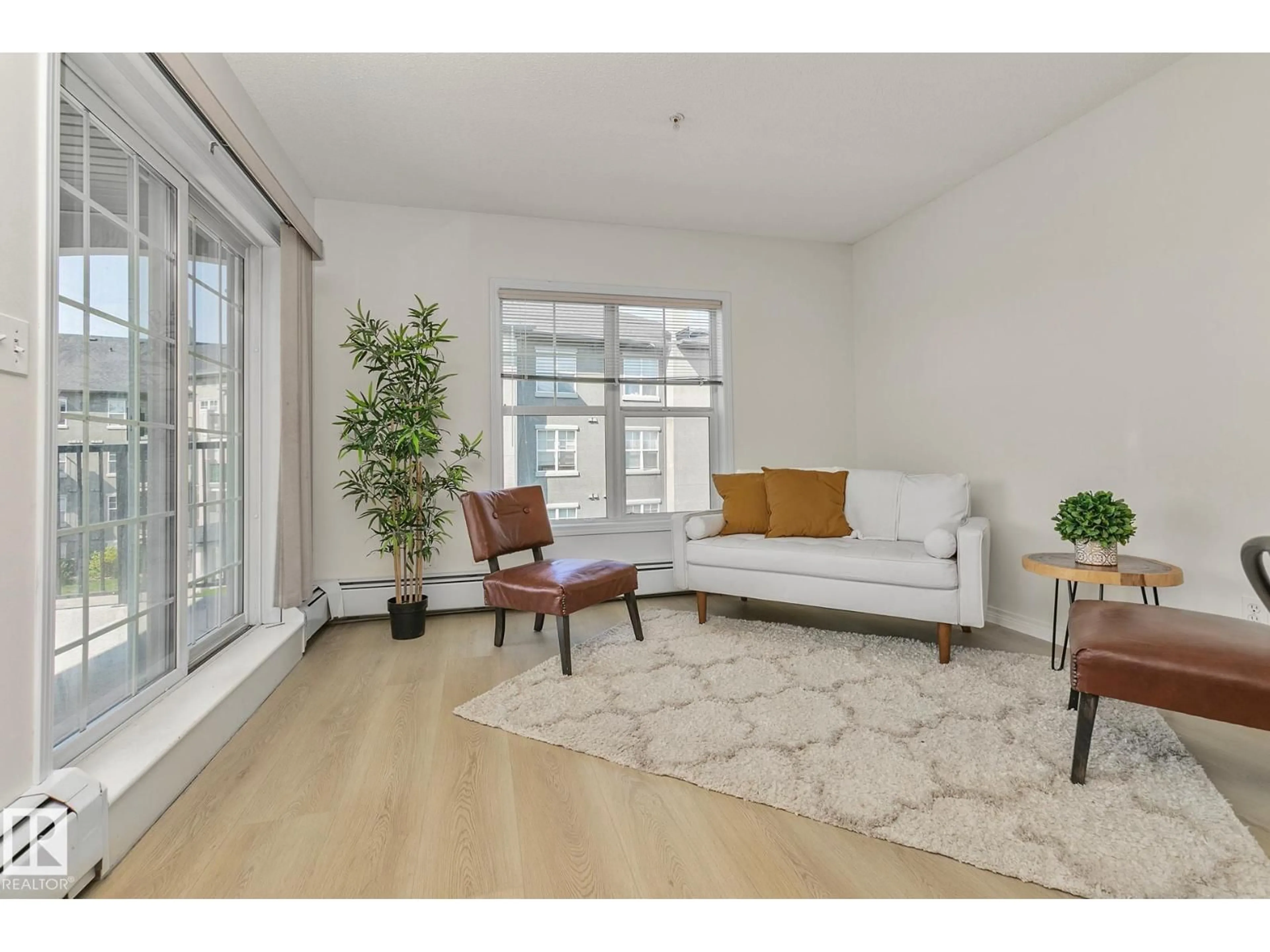 Living room with furniture, unknown for 301 - 630 MCALLISTER LO, Edmonton Alberta T6W1N3